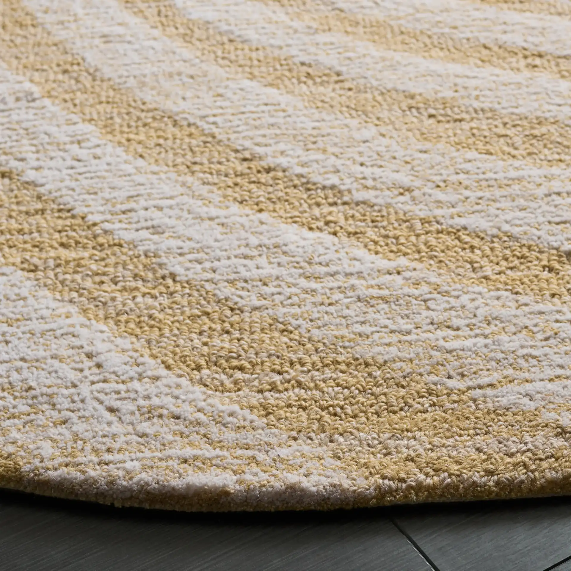 Novelty Spiral Wool Rug in Light Gold / Ivory in a styled room