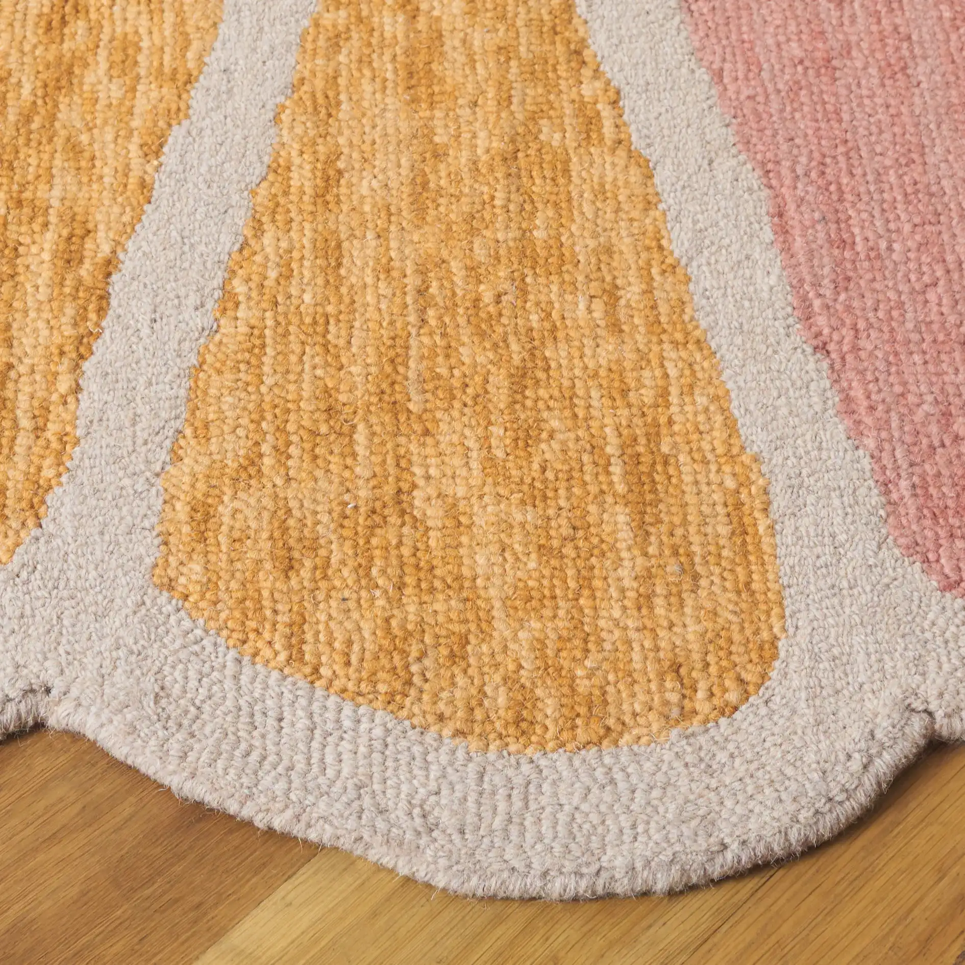 Novelty Flower Blossom Hand-Tufted Wool Rug in Beige / Blue in a styled room