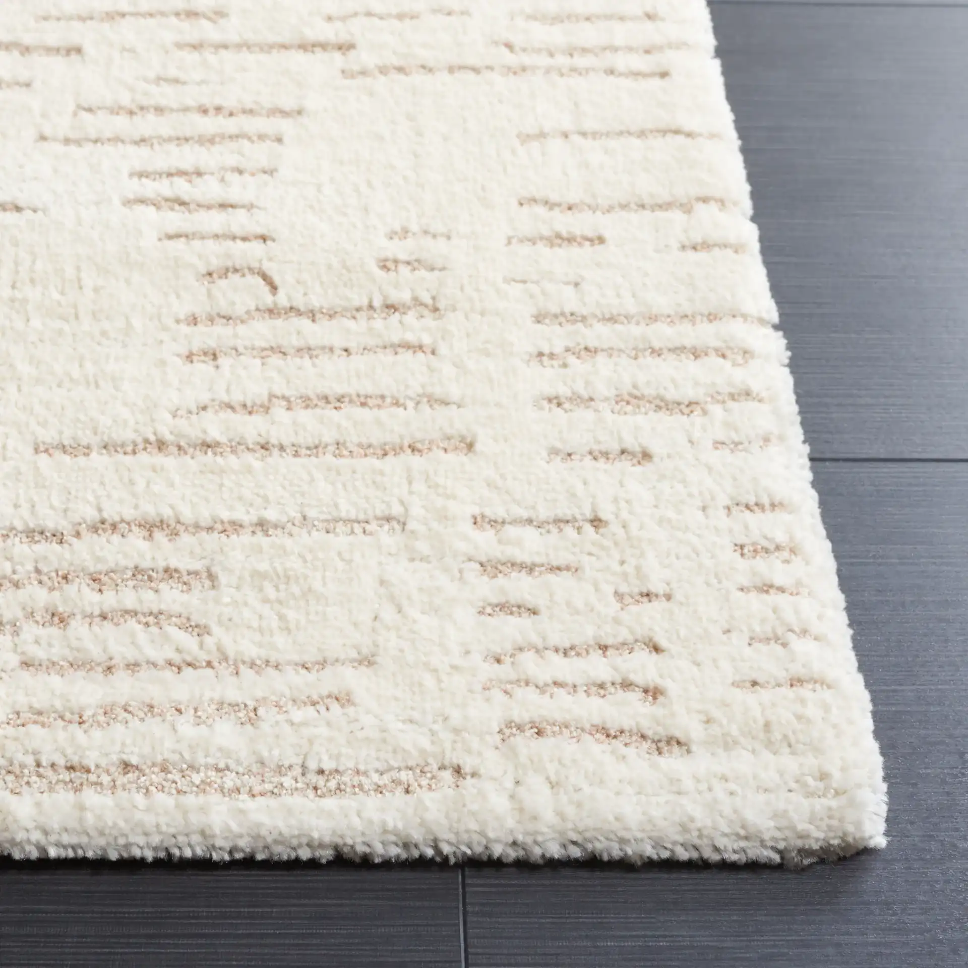 Neptune Dashed Stripe Rug in Ivory / Beige in a styled room