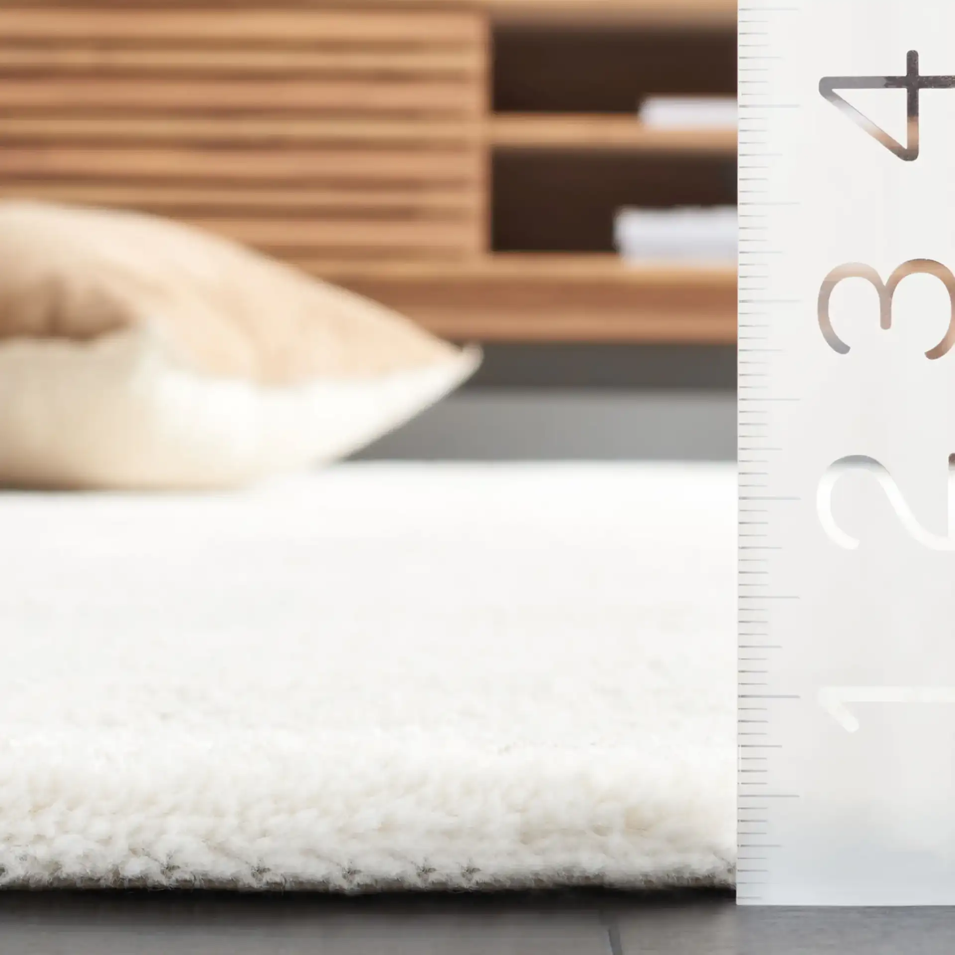 Neptune Dashed Stripe Rug in Ivory / Beige in a styled room
