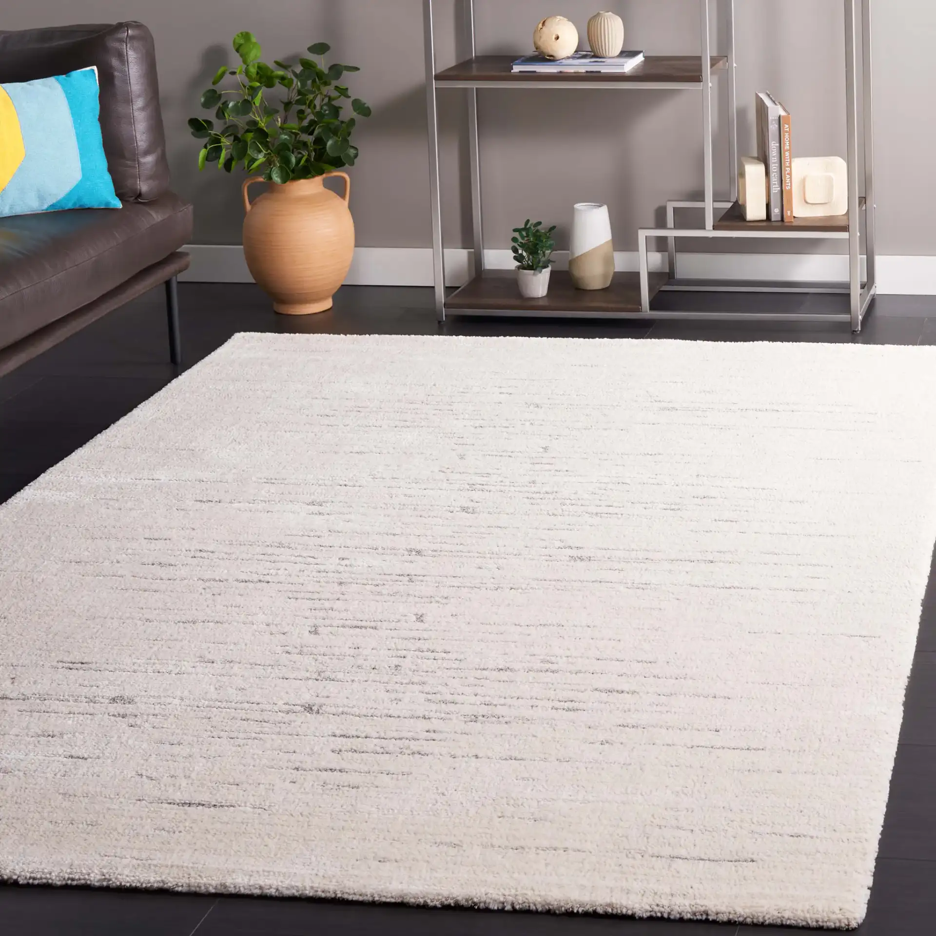 Neptune Broken Stripe Rug in Ivory / Gray in a styled room