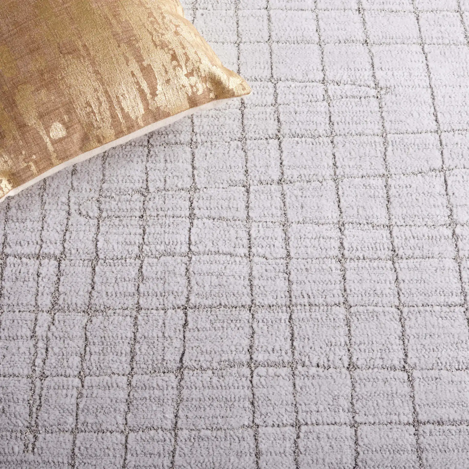 Neptune Grid Rug in Light Gray / Gray in a styled room