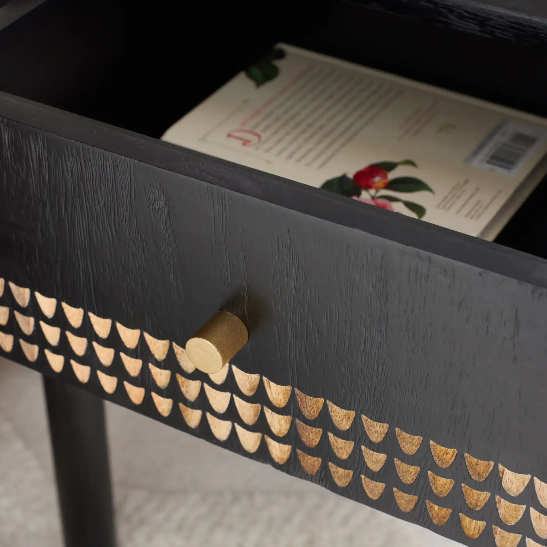 Errington One-Drawer Nightstand in Black / Natural in a styled room