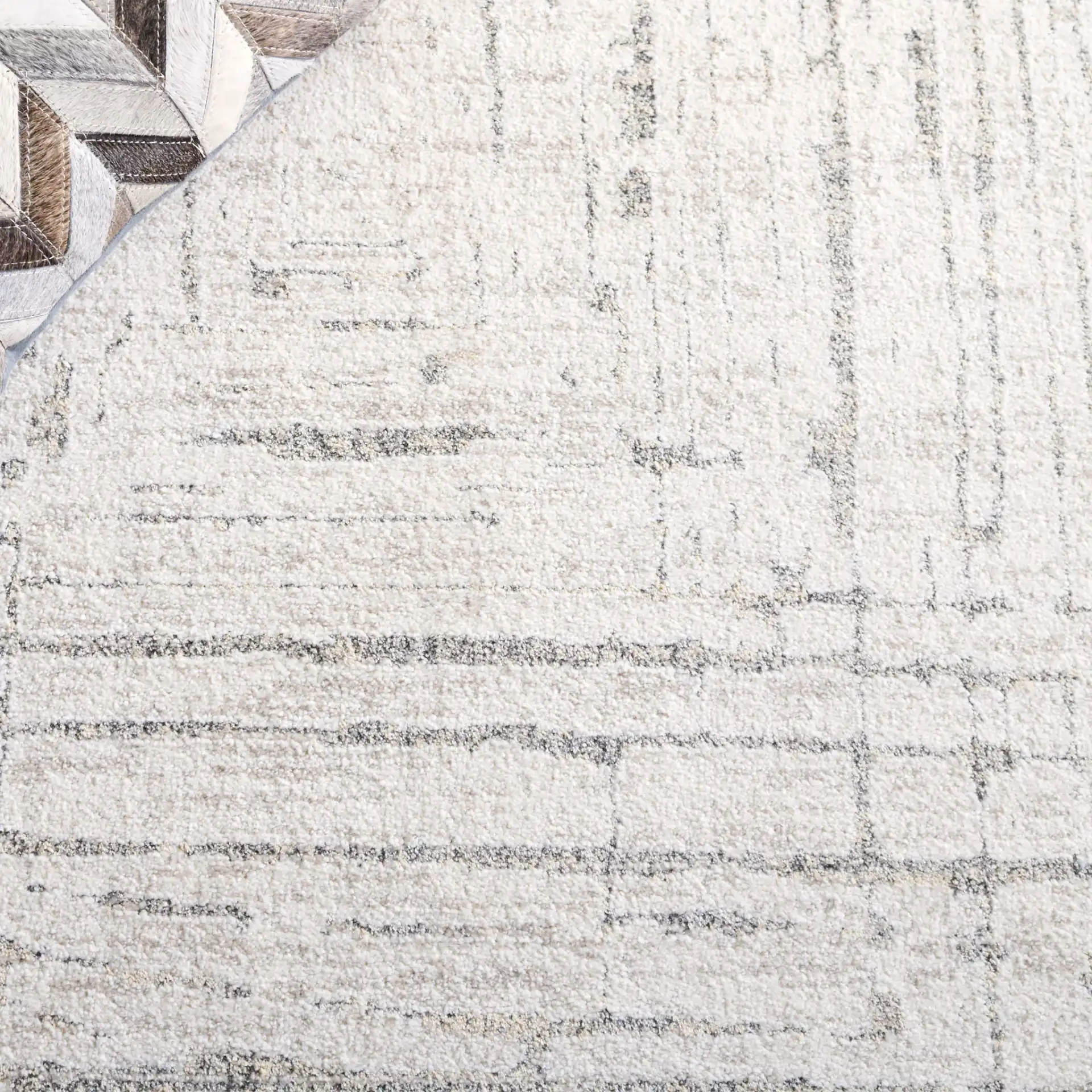 Northport Concentric Square Rug in Ivory / Gray in a styled room