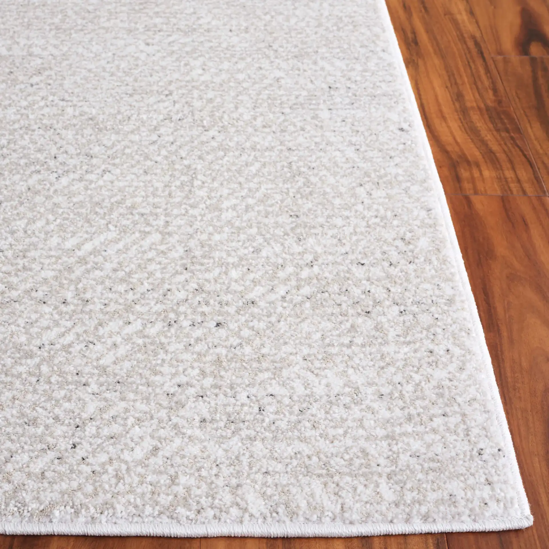 Northport Chevron Rug in Ivory / Beige in a styled room