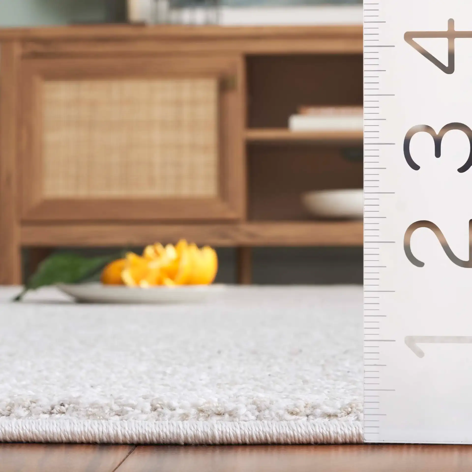 Northport Chevron Rug in Ivory / Beige in a styled room