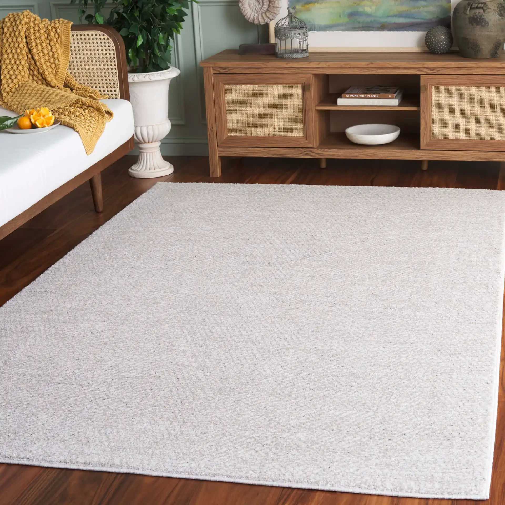 Northport Chevron Rug in Ivory / Beige in a styled room