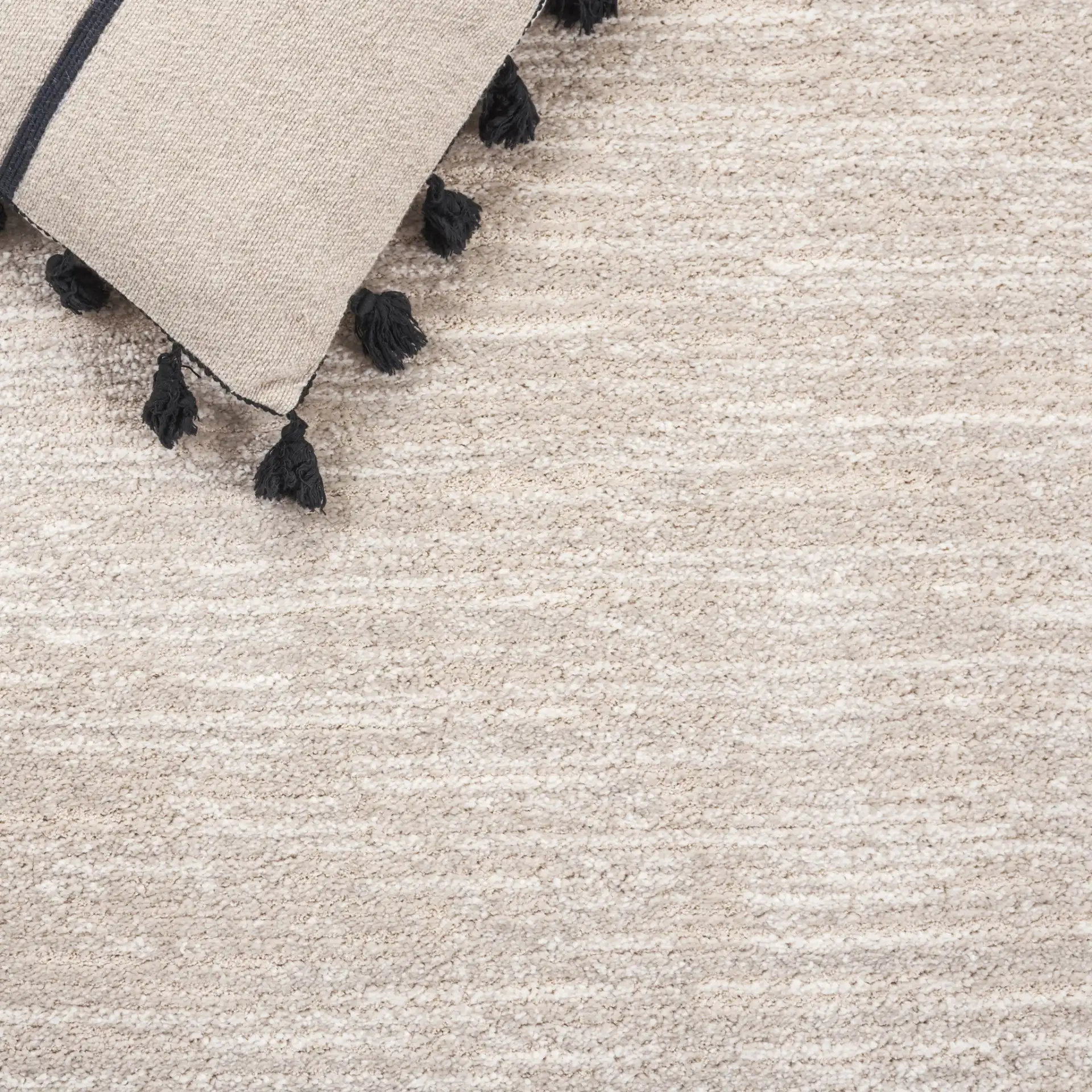 Northport Banded Stripe Rug in Ivory / Beige in a styled room