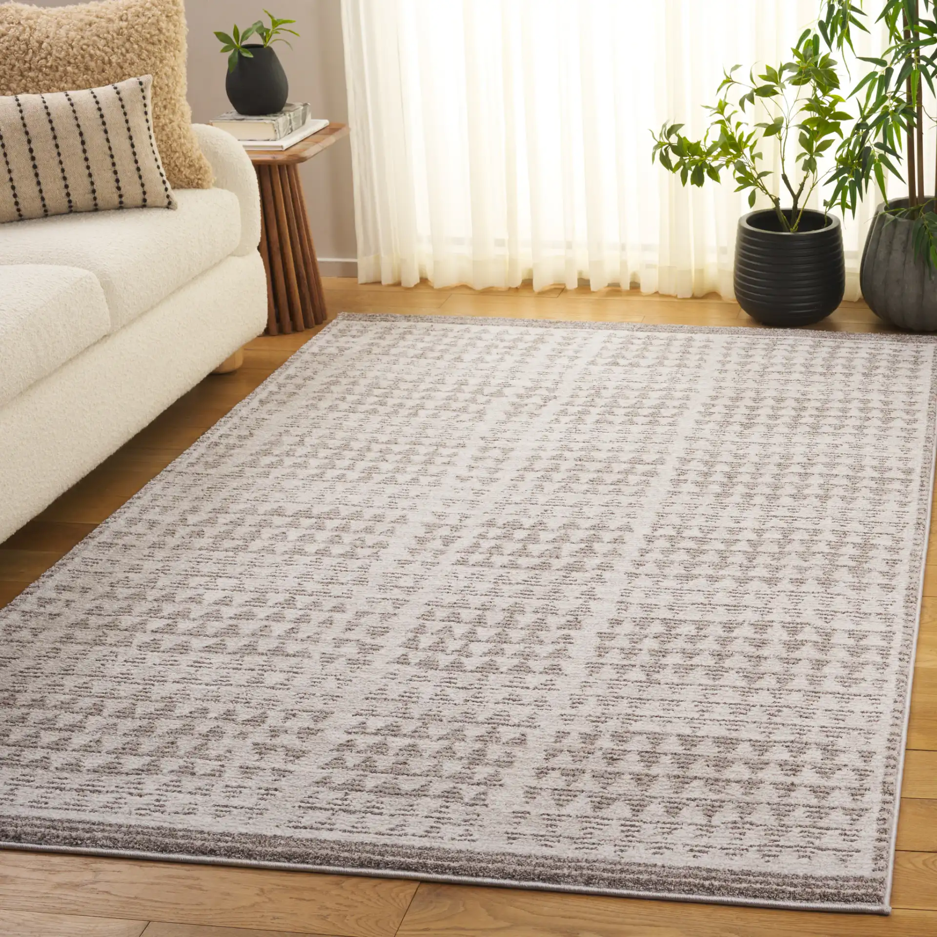 Northport Triangle Stripe Rug in Ivory / Beige in a styled room