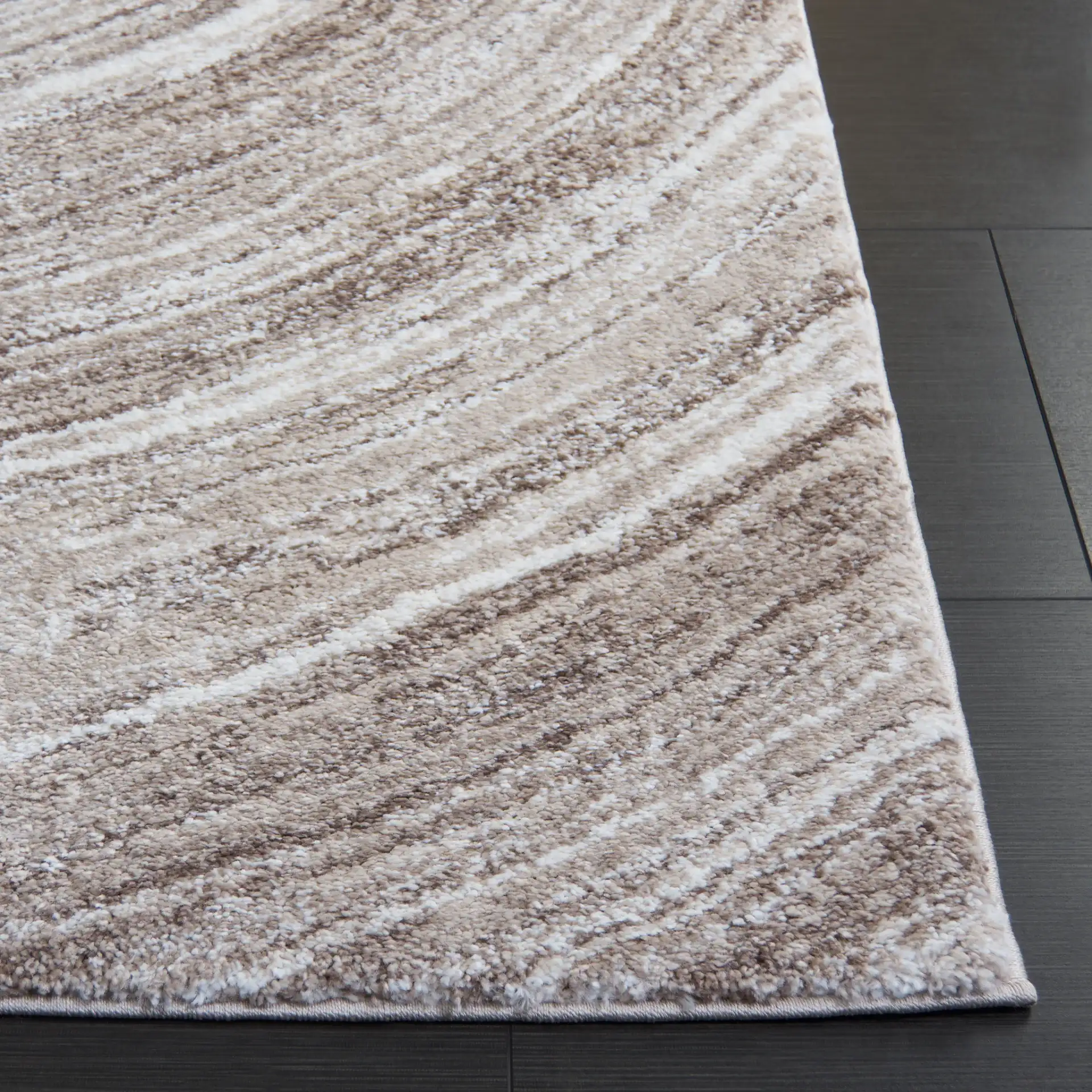 Northport Concentric Rings Rug in Taupe / Ivory in a styled room