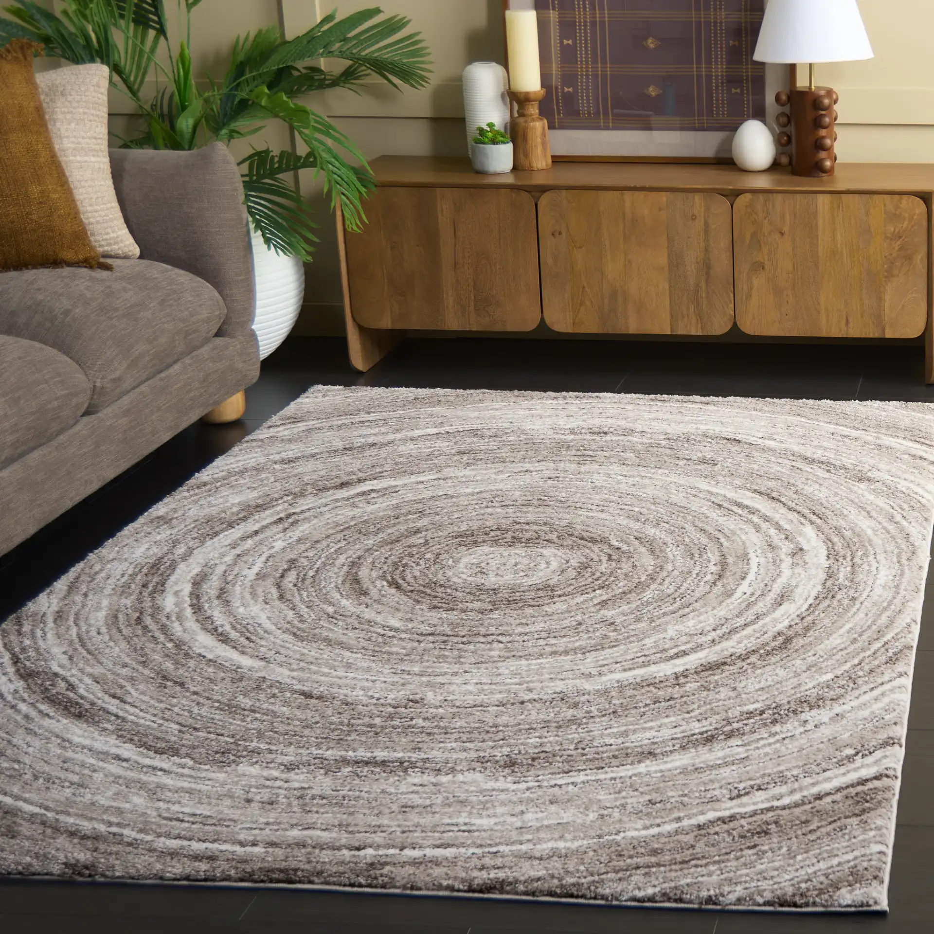 Northport Concentric Rings Rug in Taupe / Ivory in a styled room