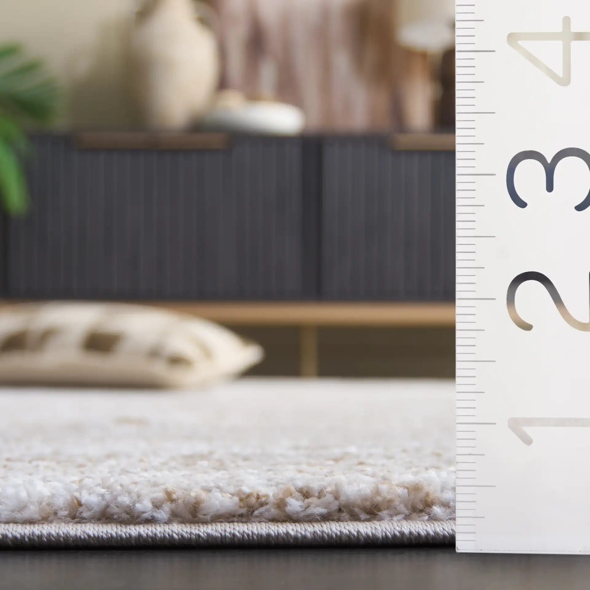 Northport Linear Abstract Rug in Taupe / Ivory in a styled room