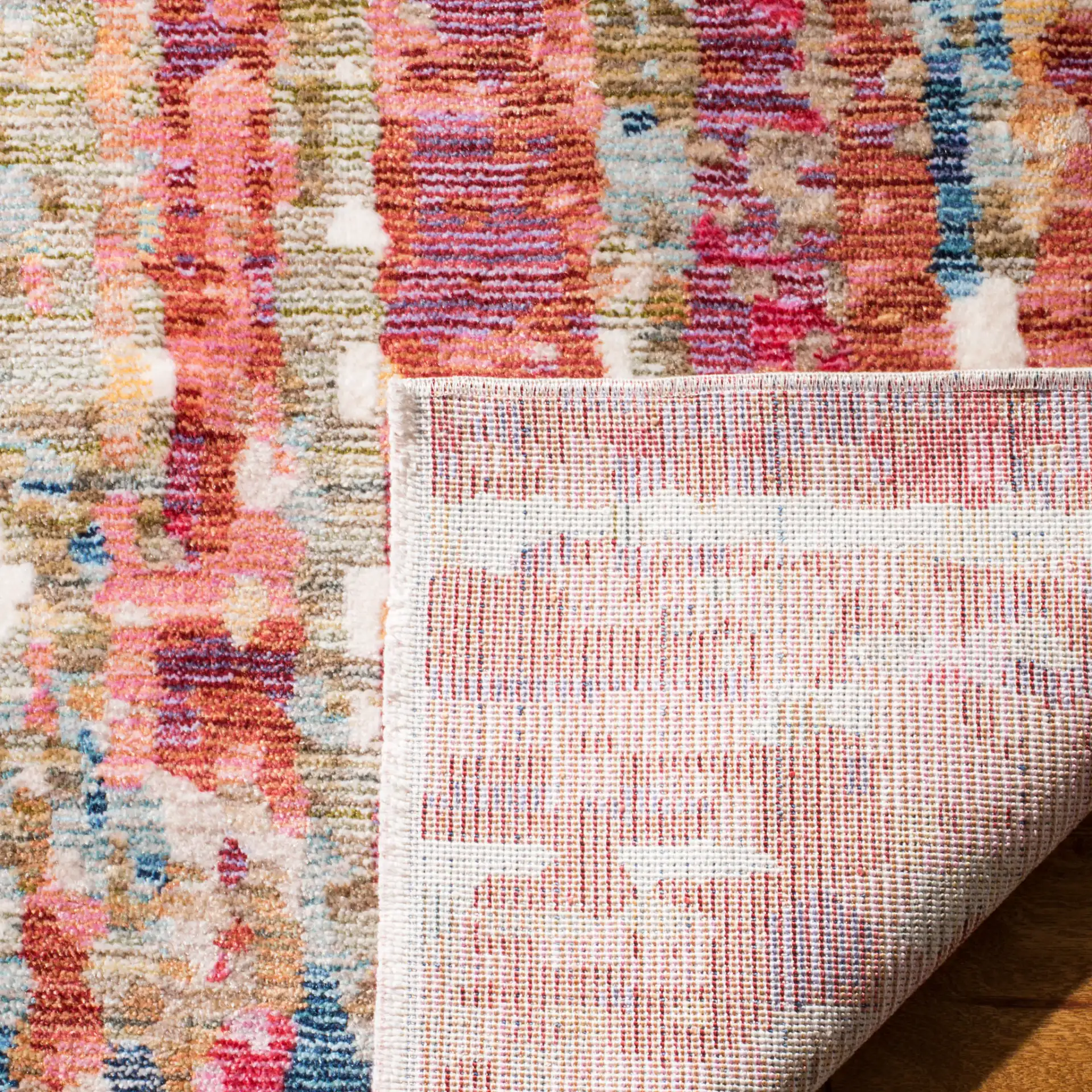 Nirvana Abstract Rug in Red / Multicolor in a styled room