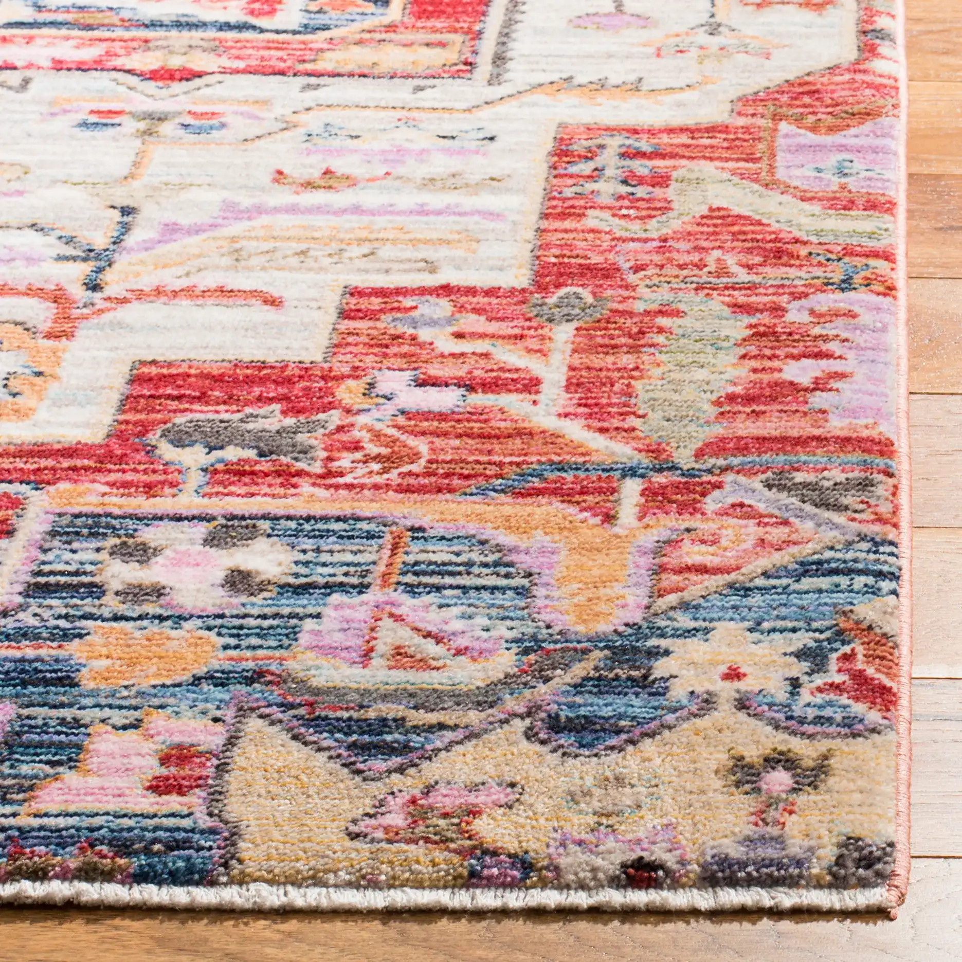 Nirvana Stepped Medallion Rug in Cream / Red in a styled room