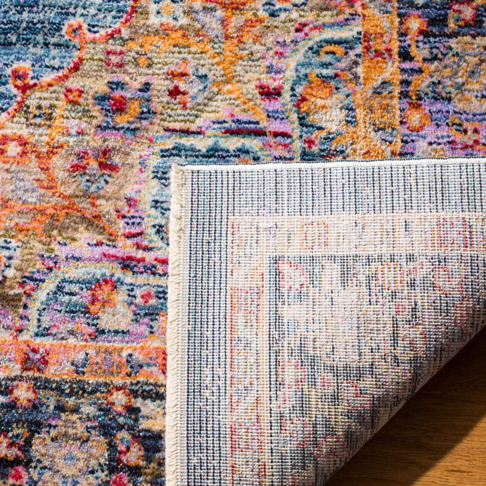 Nirvana Medallion Rug in Navy / Multicolor in a styled room