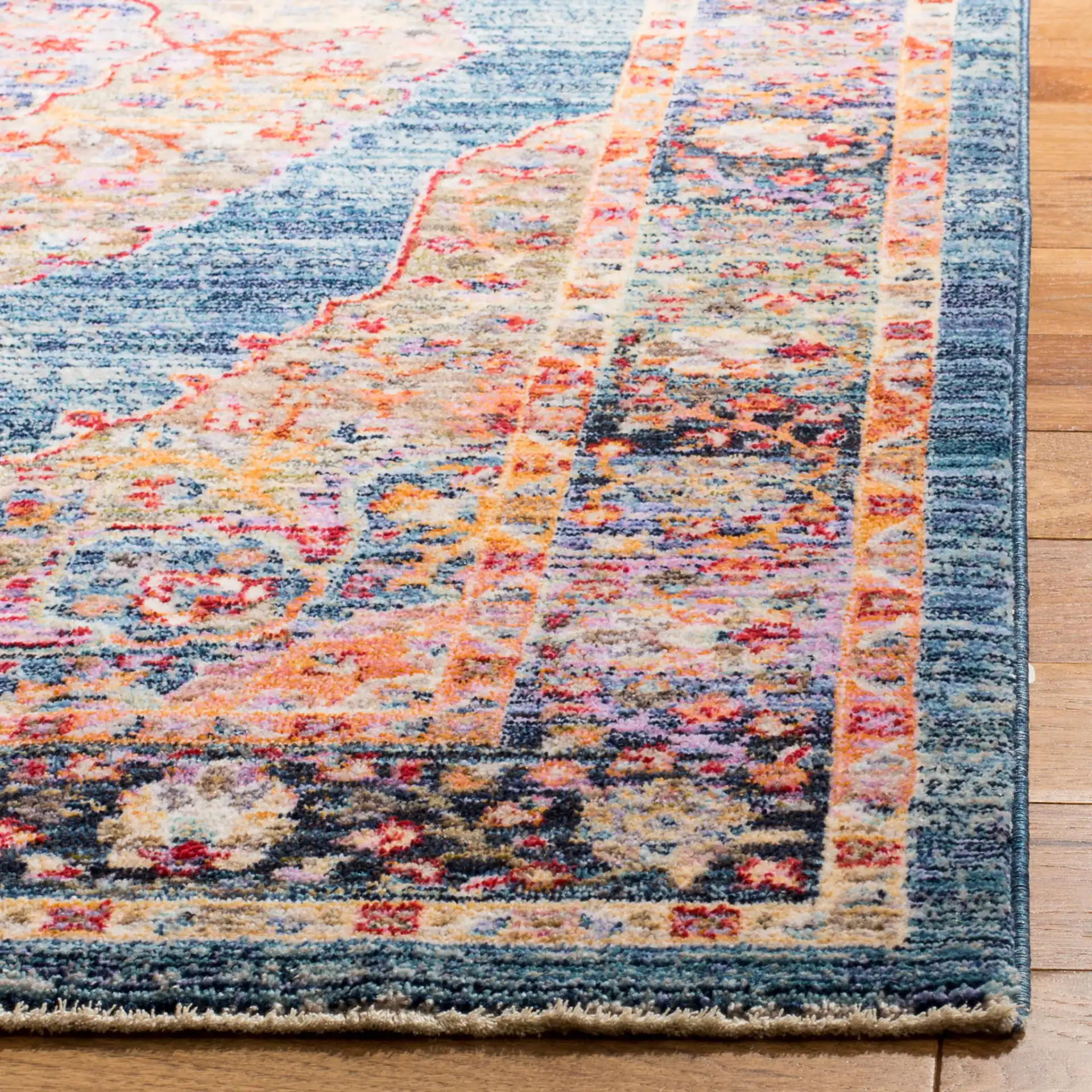 Nirvana Medallion Rug in Navy / Multicolor in a styled room
