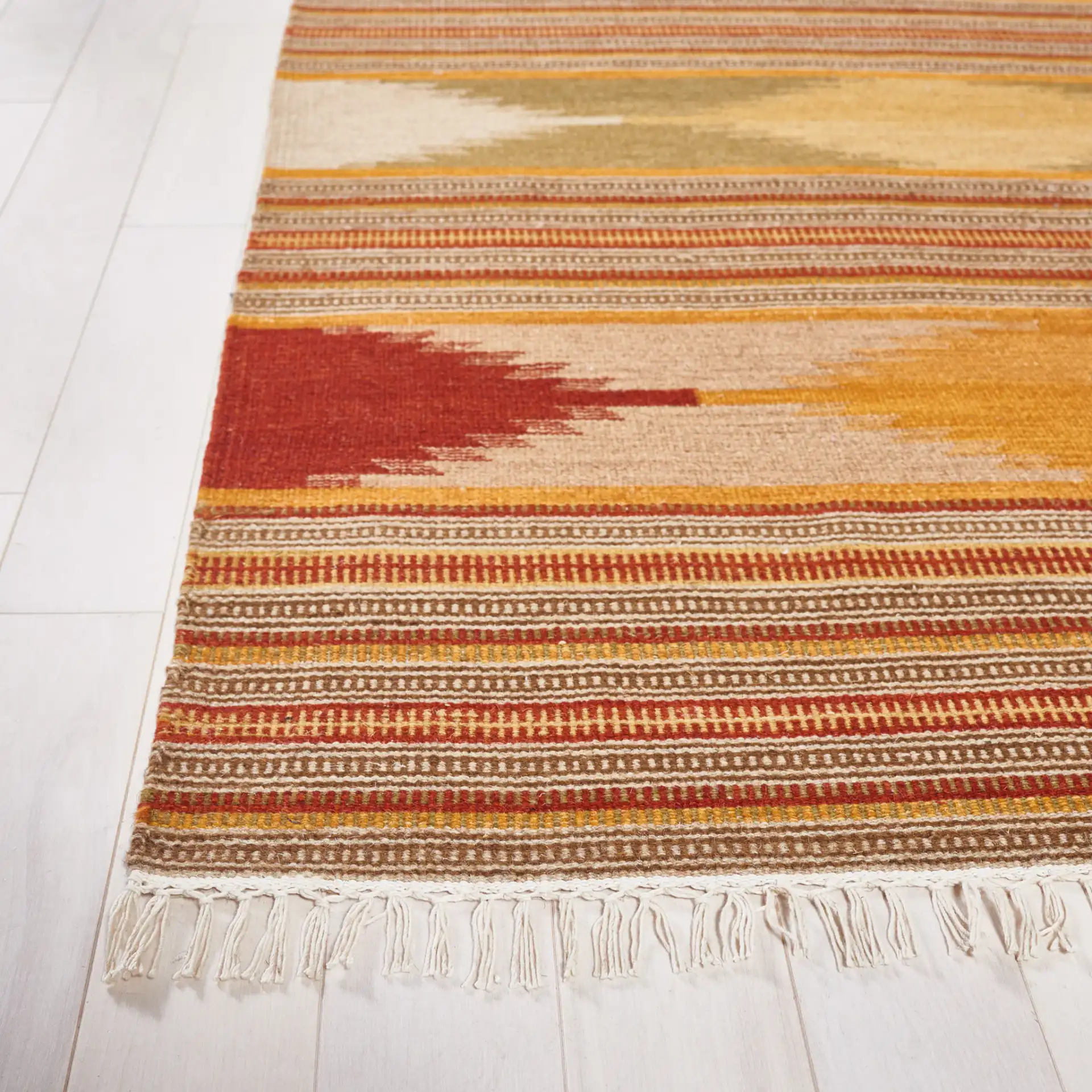 Kilim Diamond Stripe Hand-Woven Wool Rug in Natural / Multicolor in a styled room