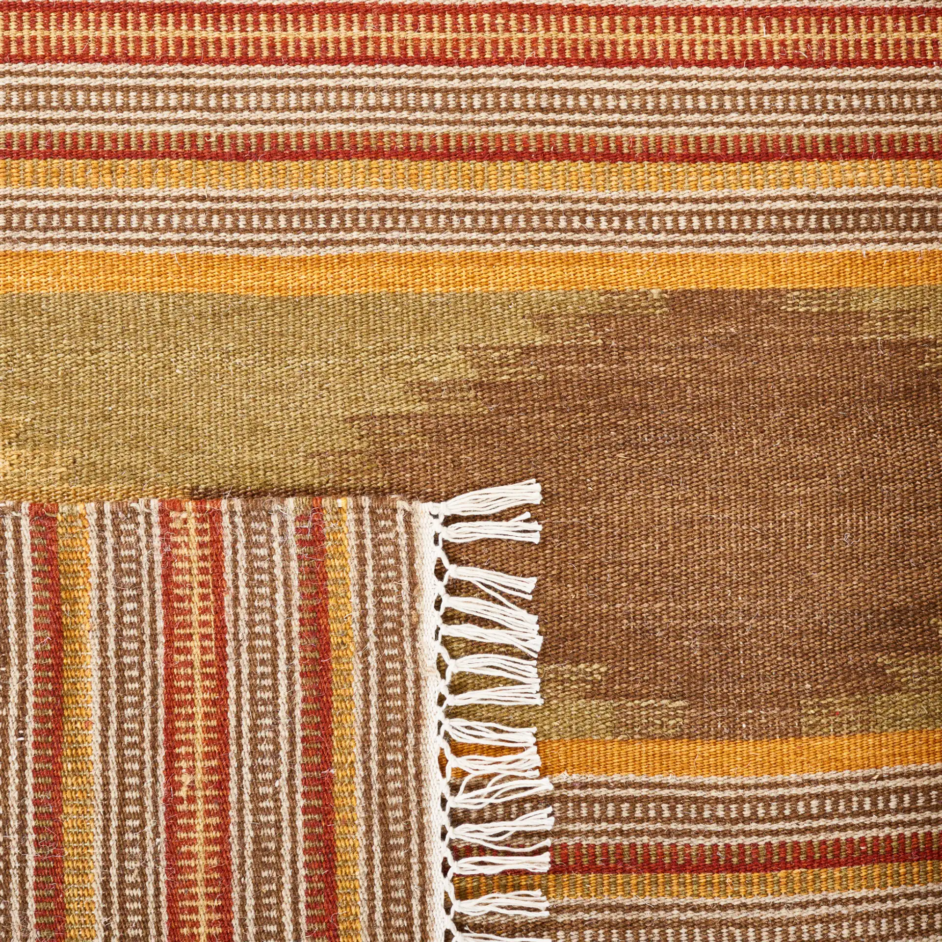 Kilim Diamond Stripe Hand-Woven Wool Rug in Natural / Multicolor in a styled room