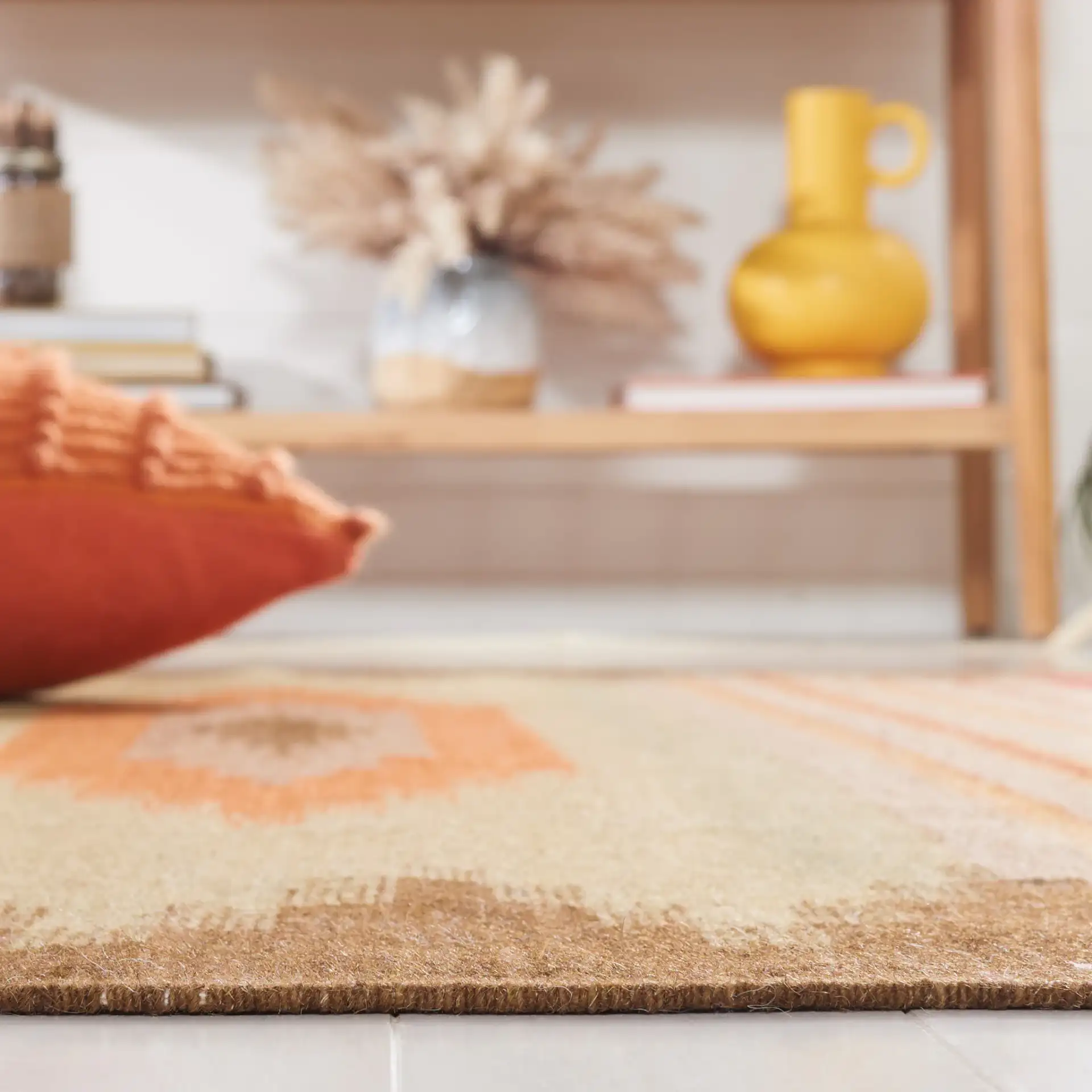 Kilim Southwestern Striped Hand-Woven Wool Rug in Brown / Multicolor in a styled room
