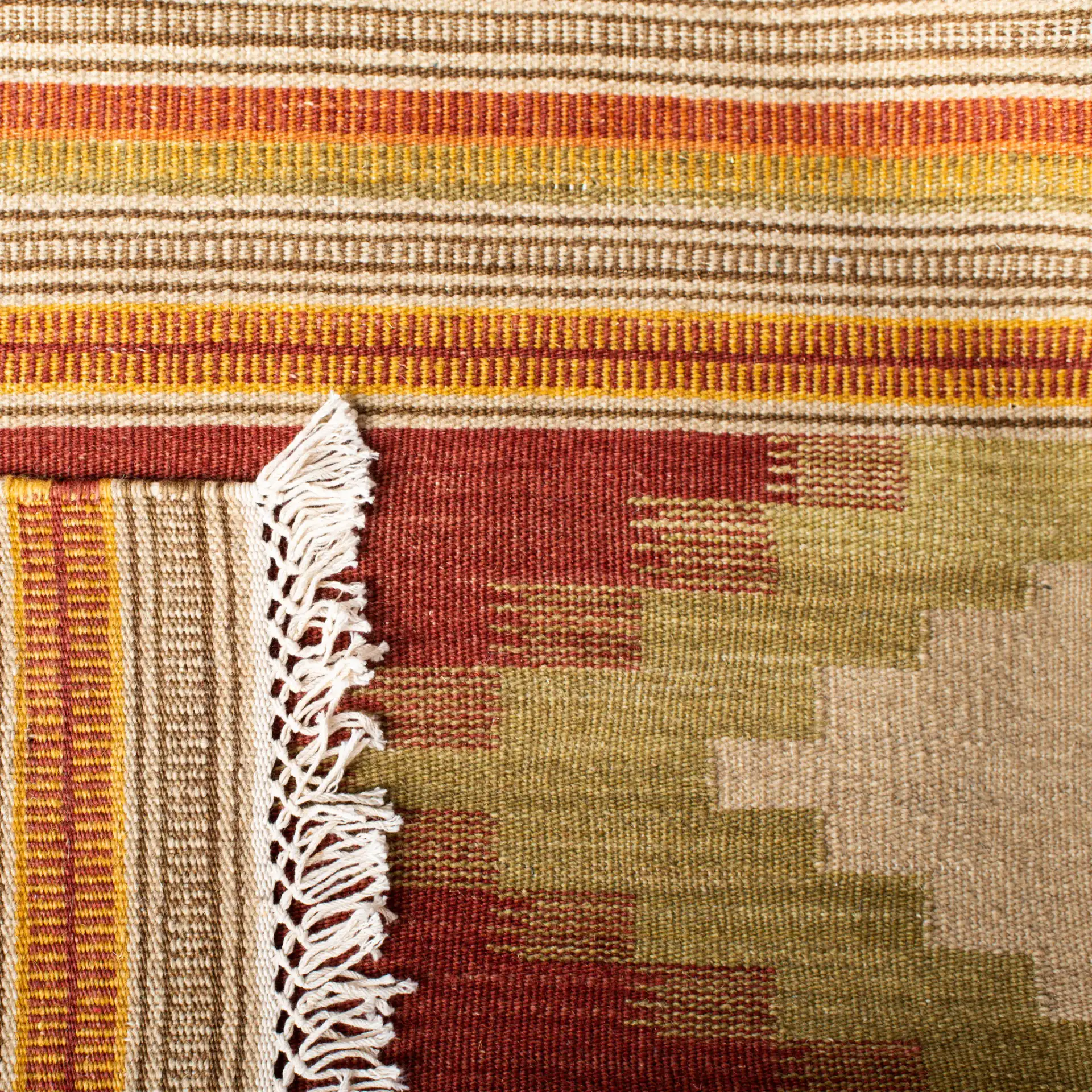 Kilim Striped Diamond Hand-Woven Wool Rug in Red / Multicolor in a styled room