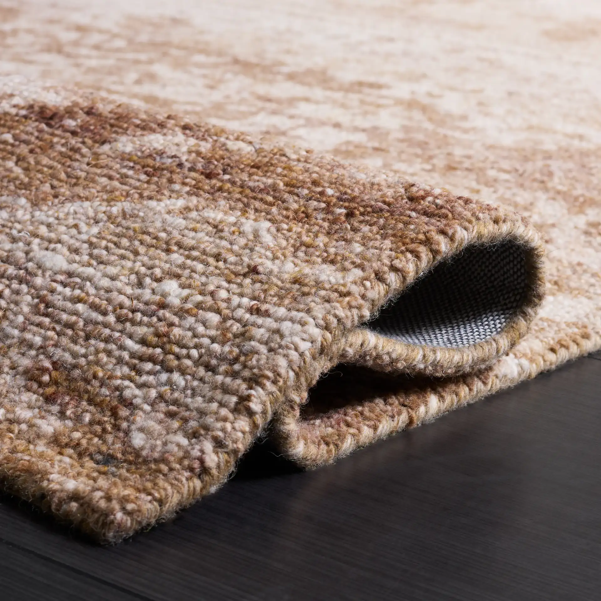 Oakwood Abstract Mottled Hand-Tufted Wool Rug in Natural / Brown in a styled room