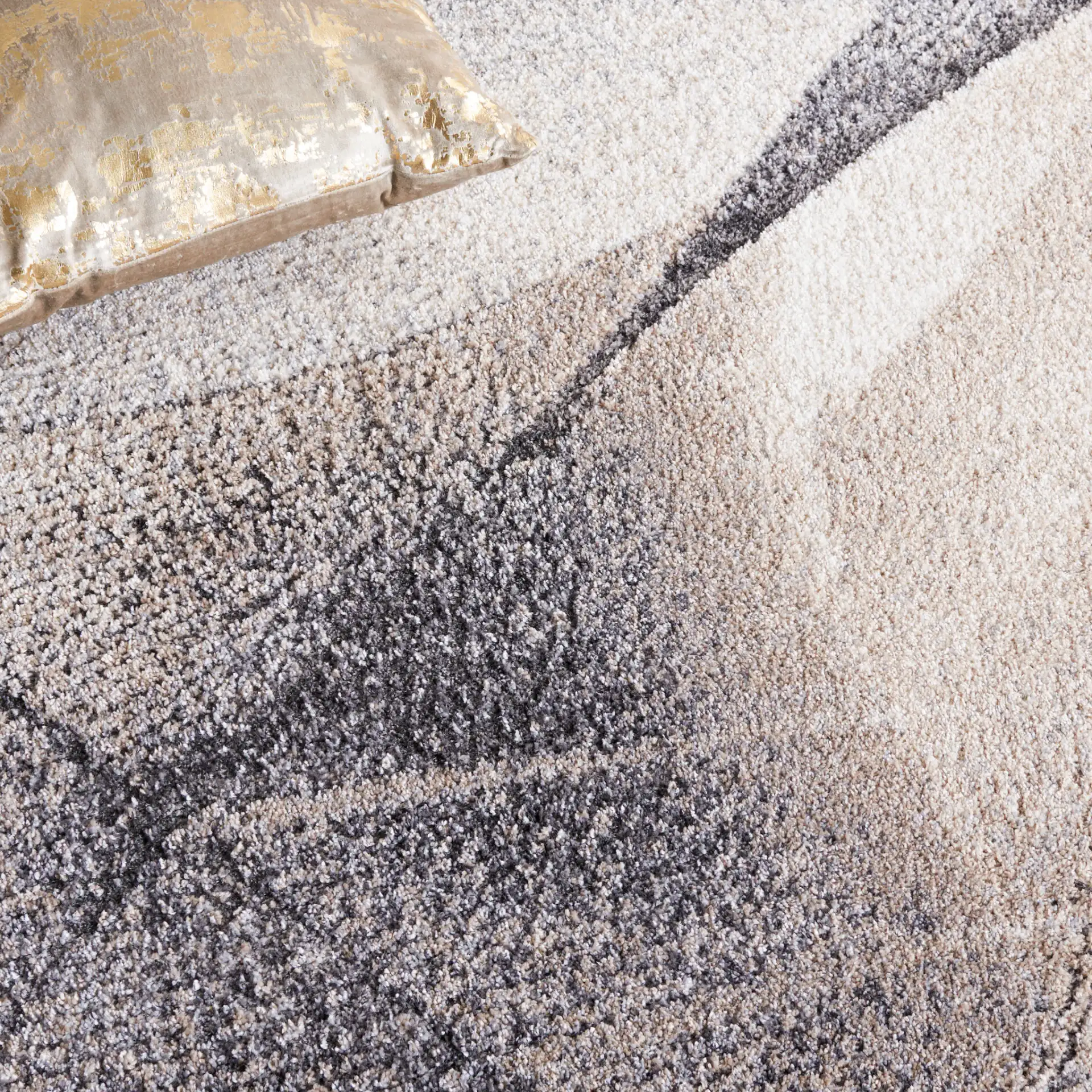 Opal Intersecting Planes Rug in Gray / Ivory in a styled room