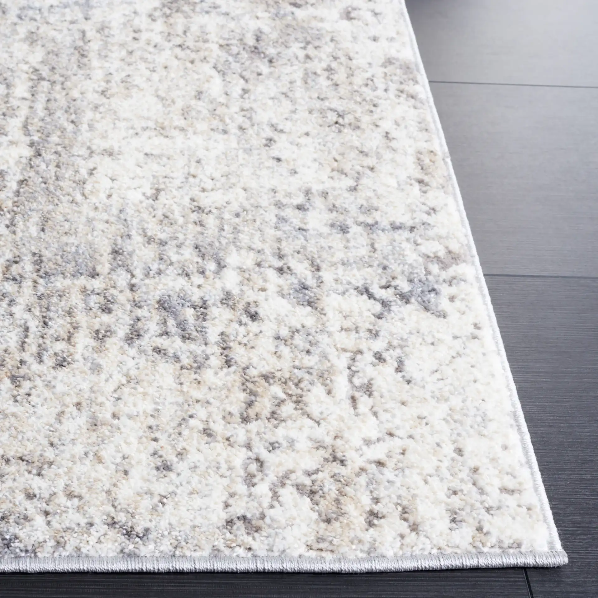 Opal Distressed Block Rug in Ivory / Gray in a styled room