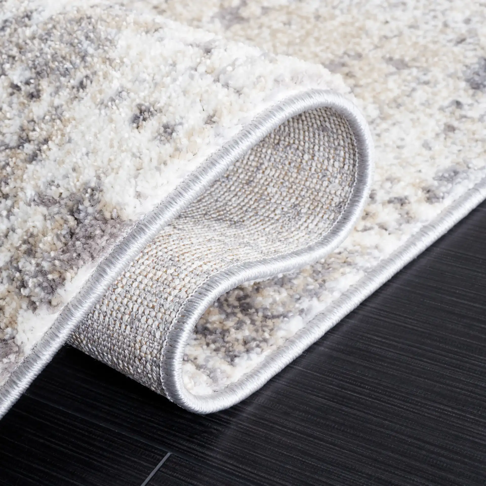 Opal Distressed Block Rug in Ivory / Gray in a styled room