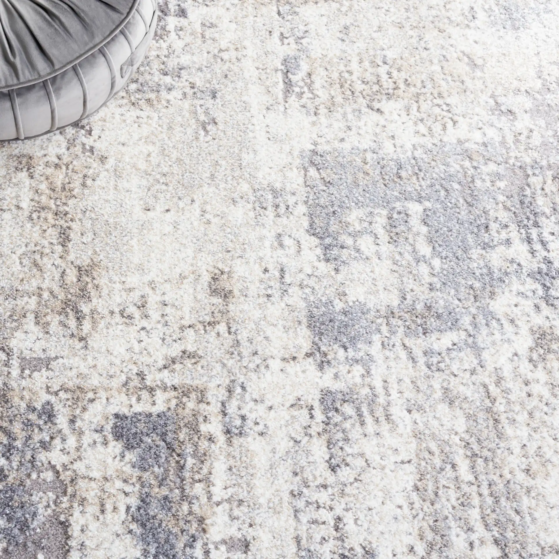 Opal Distressed Block Rug in Ivory / Gray in a styled room