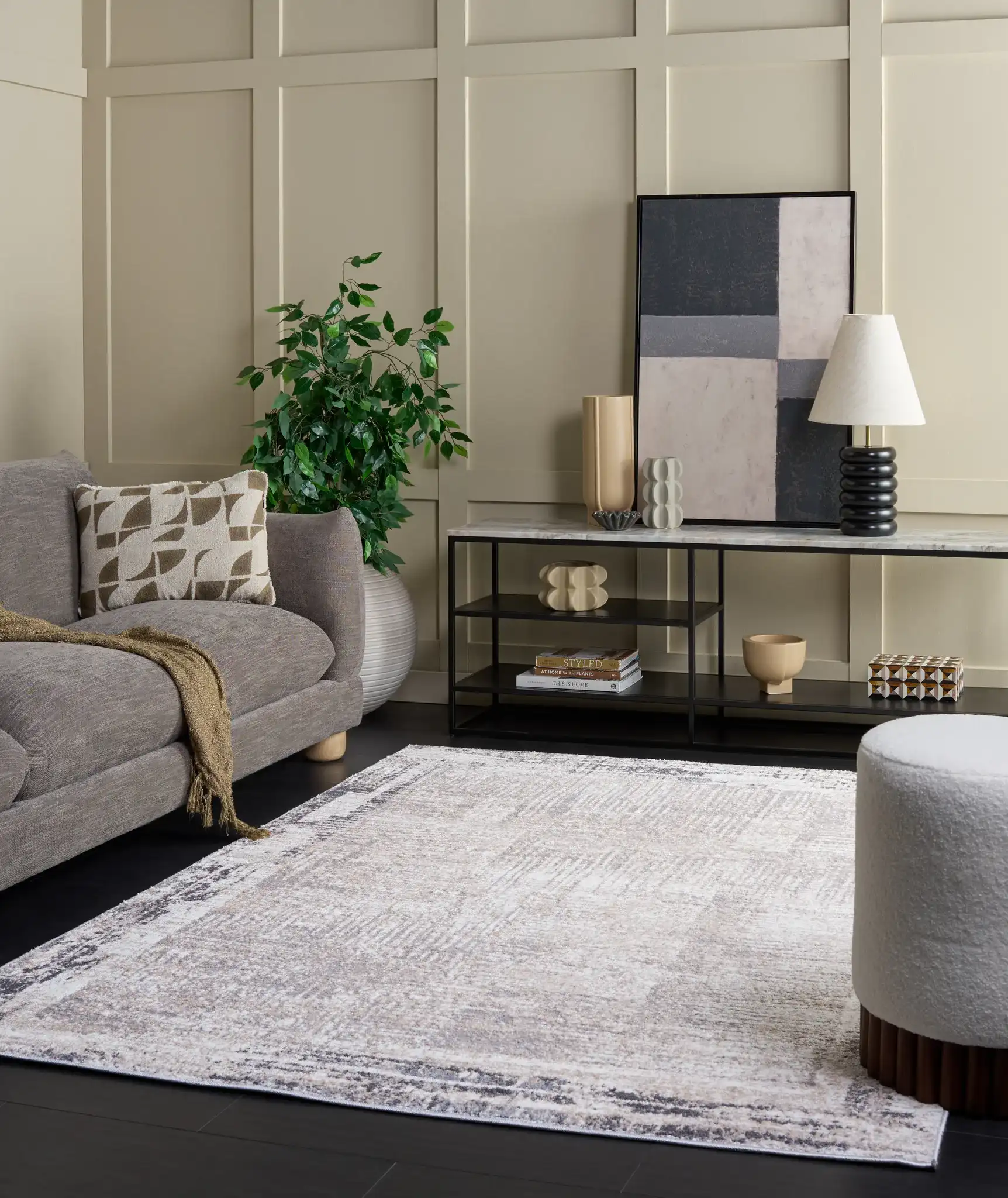 Opal Abstract Border Rug in Ivory / Gray in a styled room