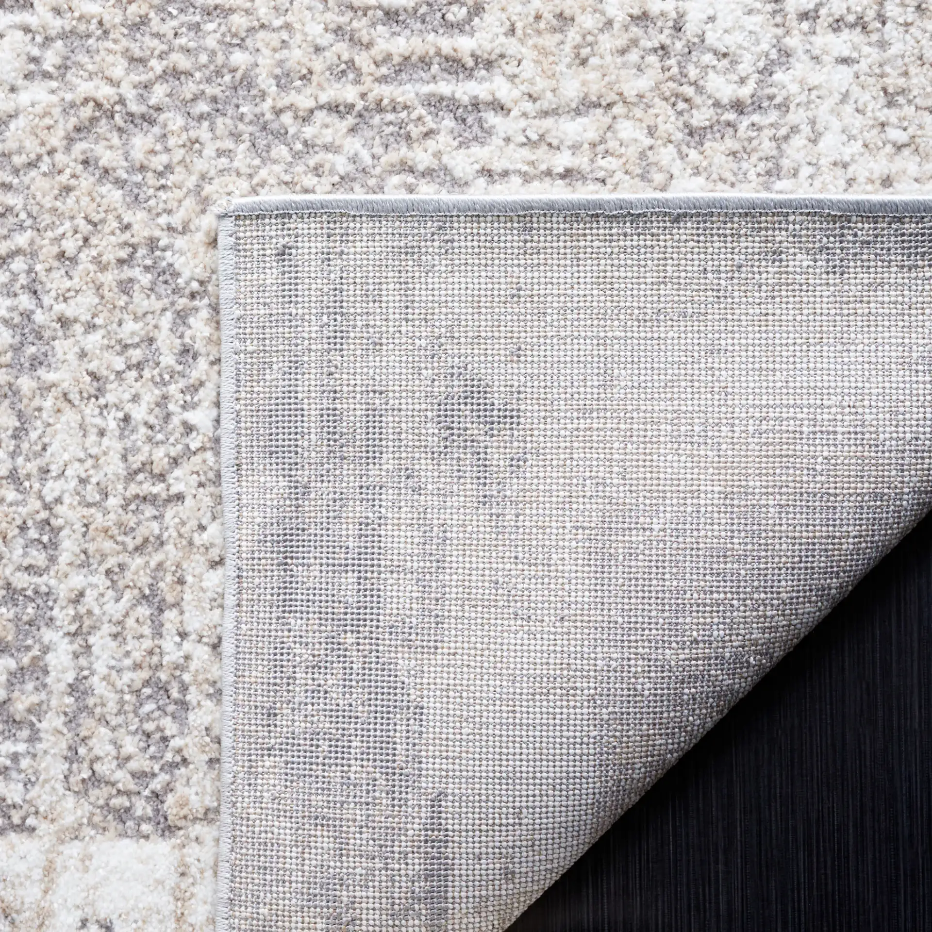 Opal Abstract Border Rug in Ivory / Gray in a styled room