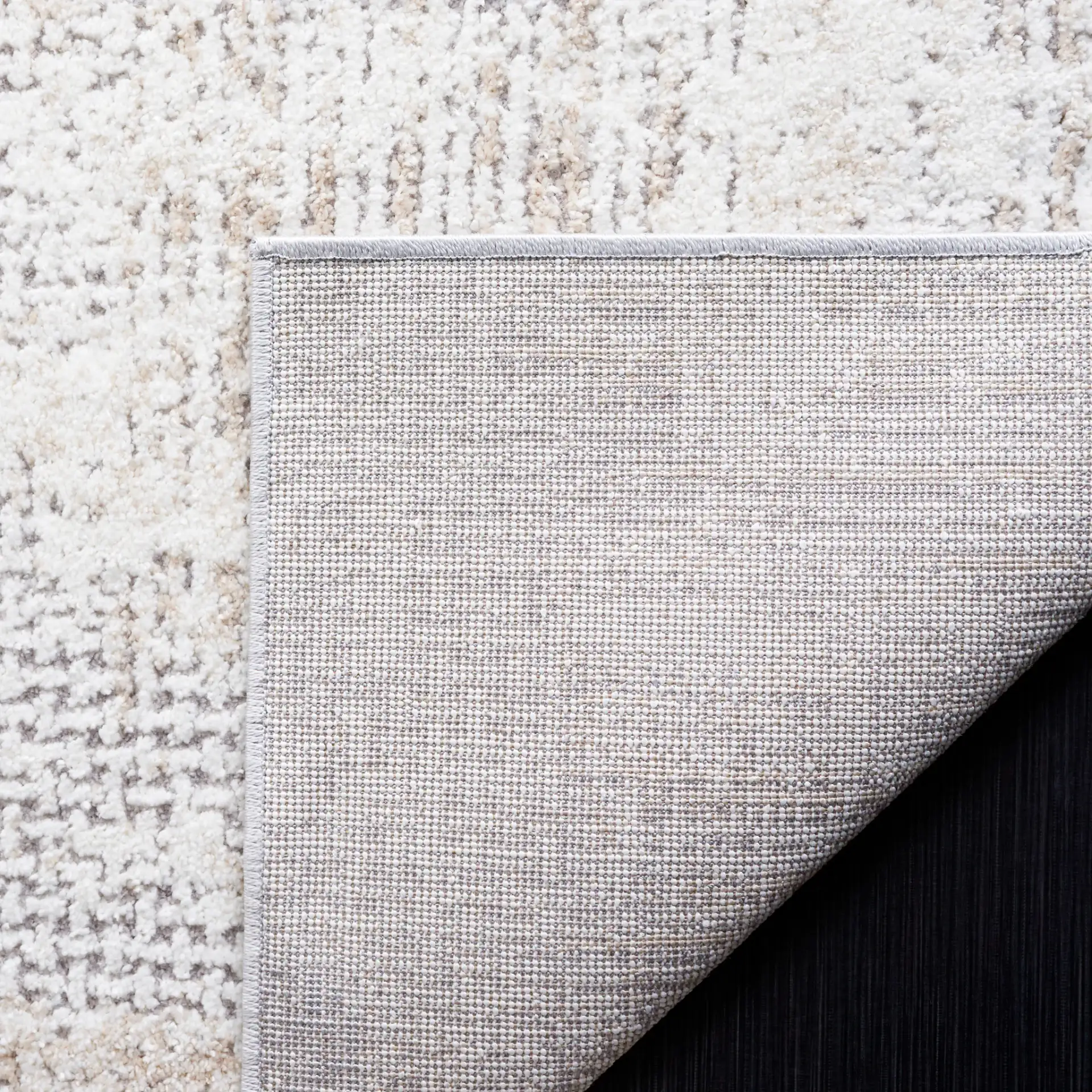 Opal Textured Block Rug in Ivory / Gray in a styled room
