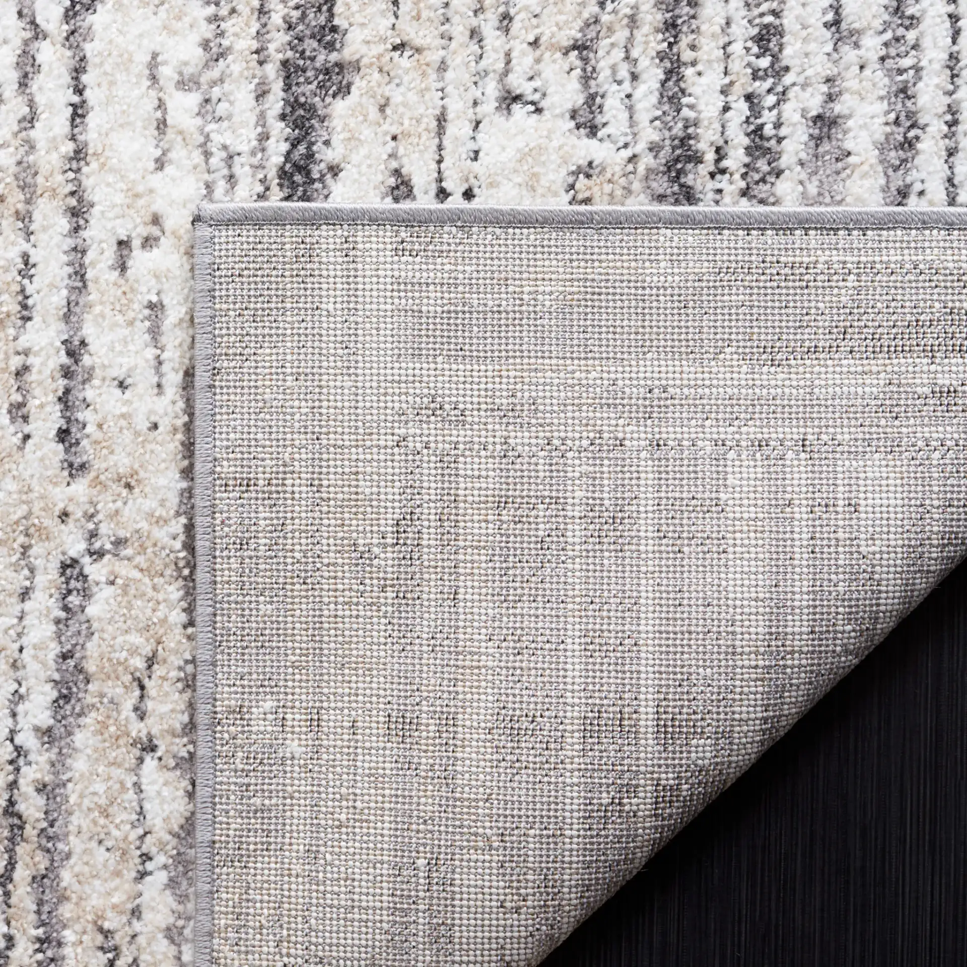 Opal Linear Block Rug in Ivory / Dark Gray in a styled room