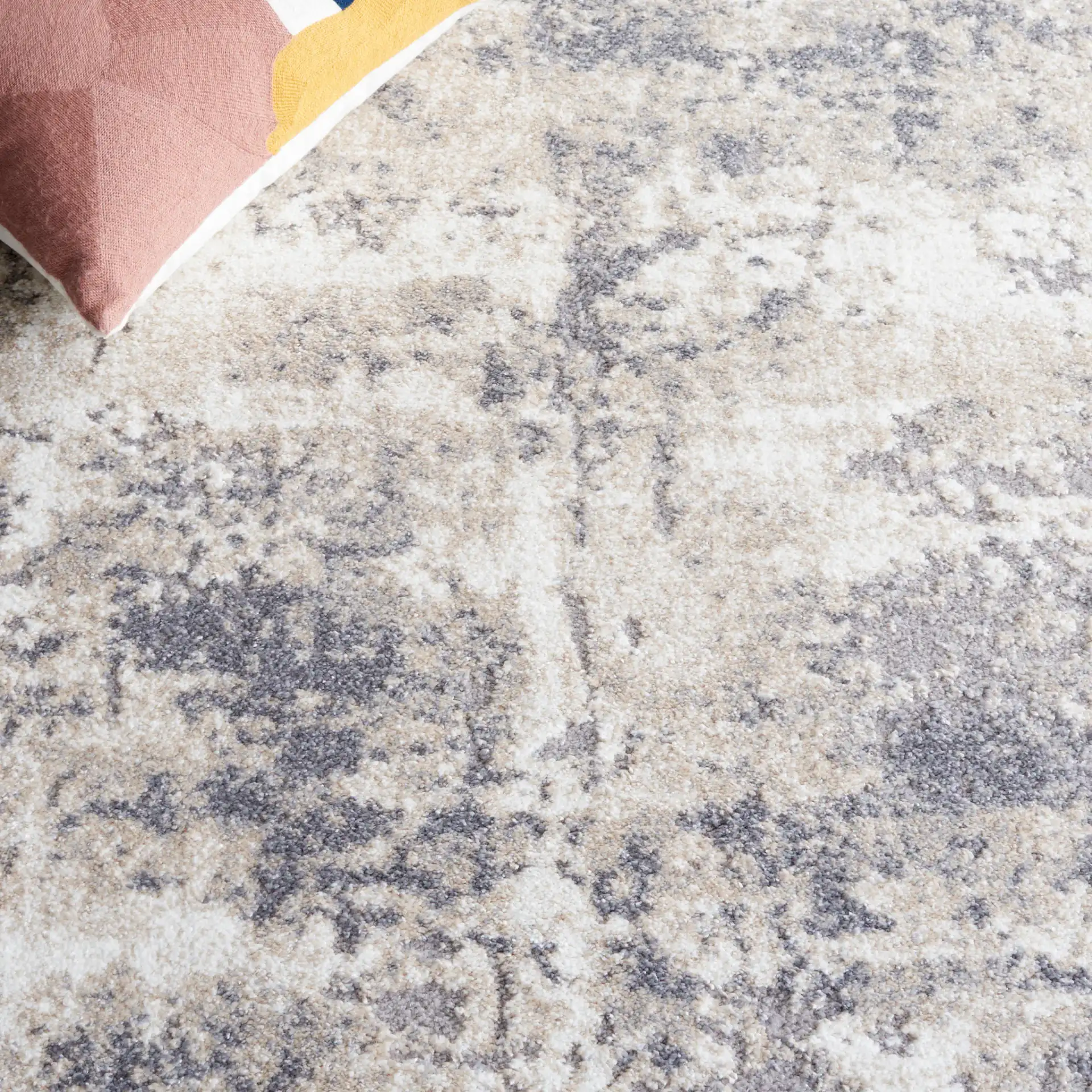 Opal Distressed Abstract Rug in Gray / Beige in a styled room