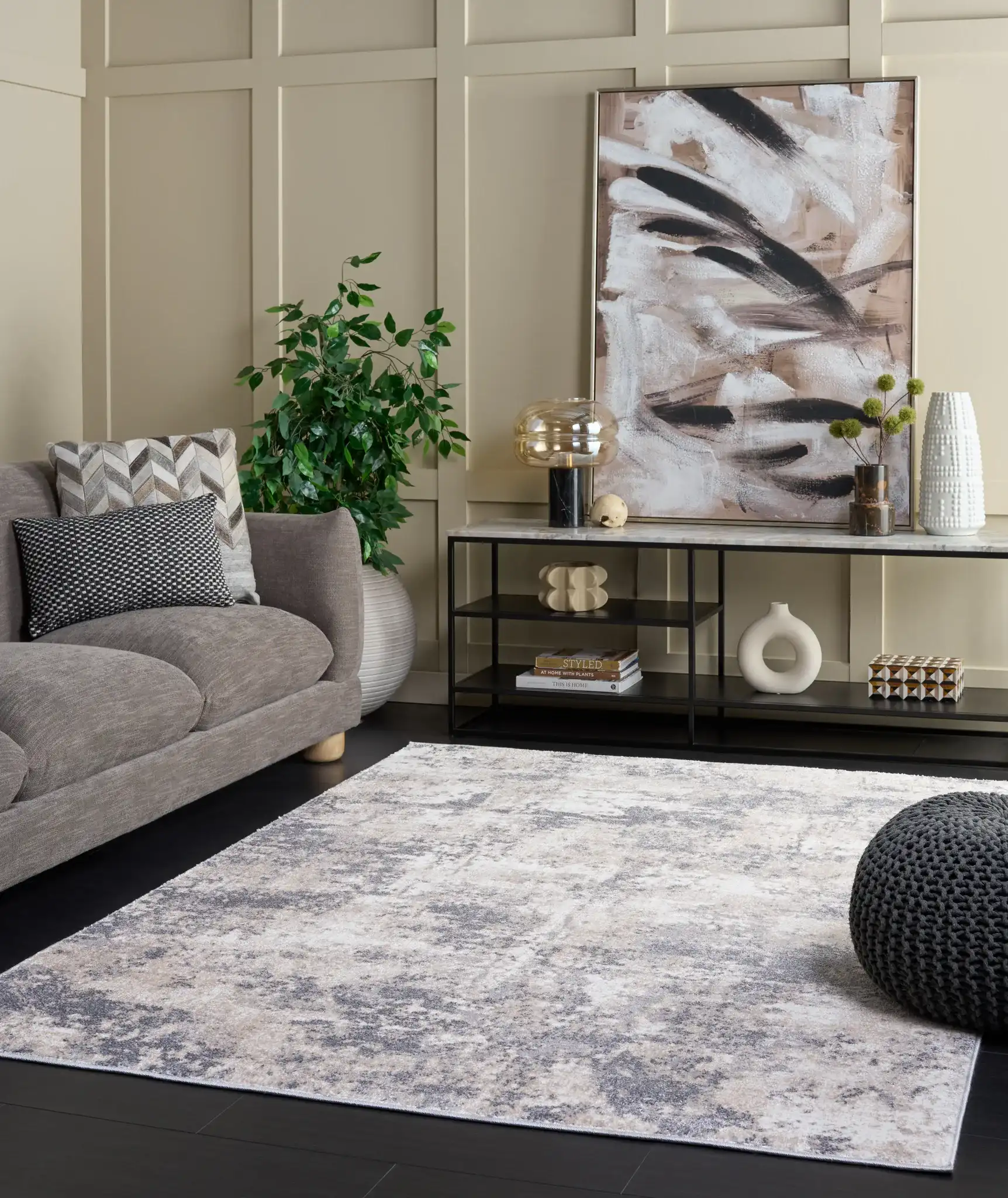 Opal Distressed Abstract Rug in Gray / Beige in a styled room