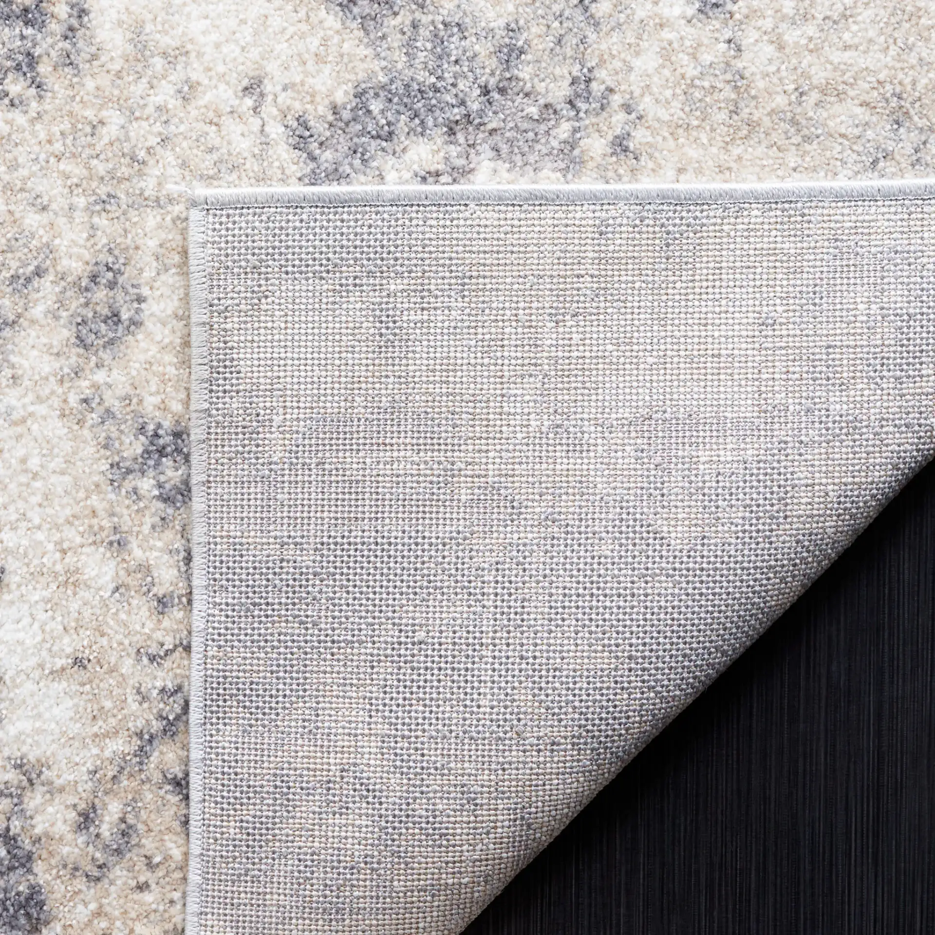Opal Distressed Abstract Rug in Gray / Beige in a styled room