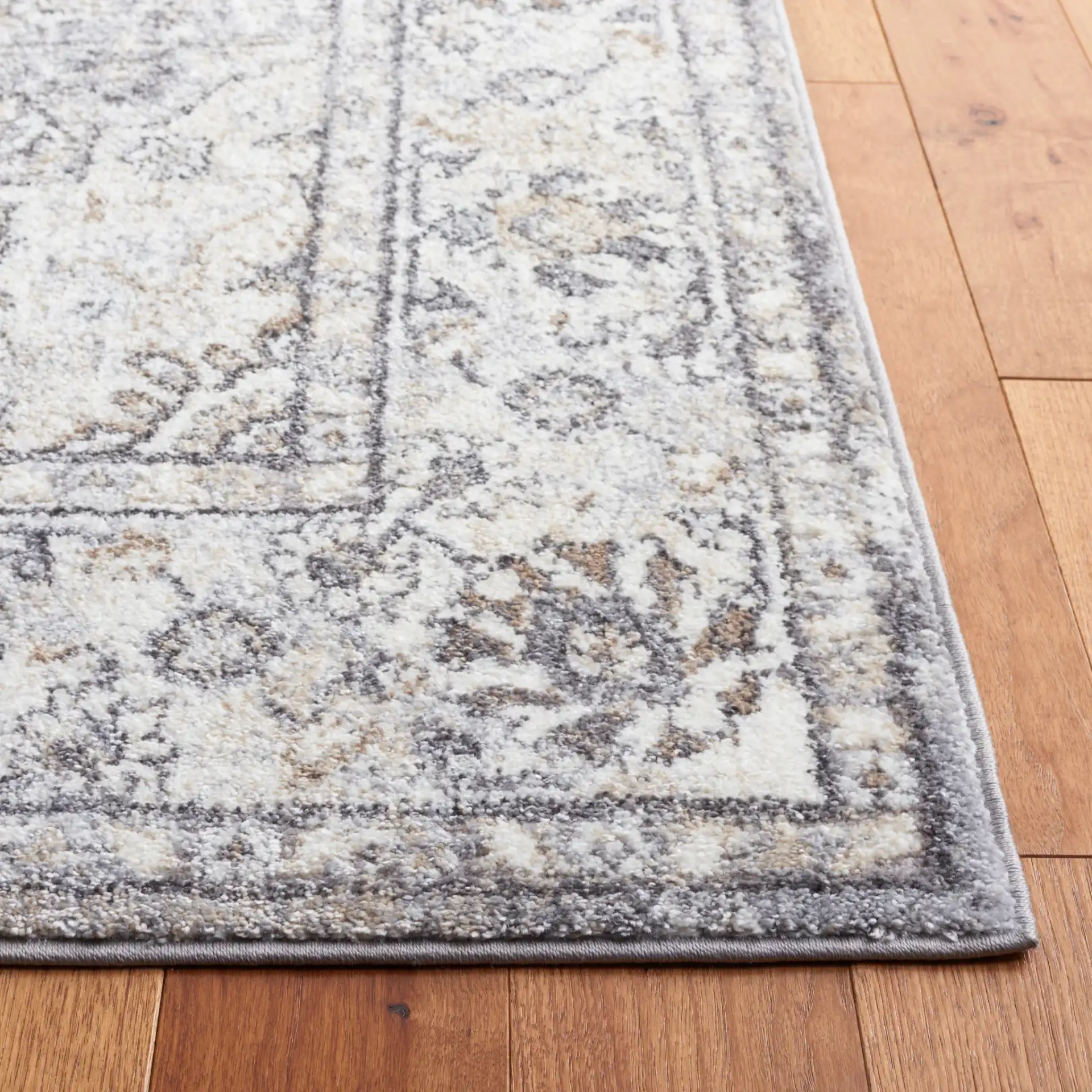 Opal Medallion Rug in Gray / Ivory in a styled room