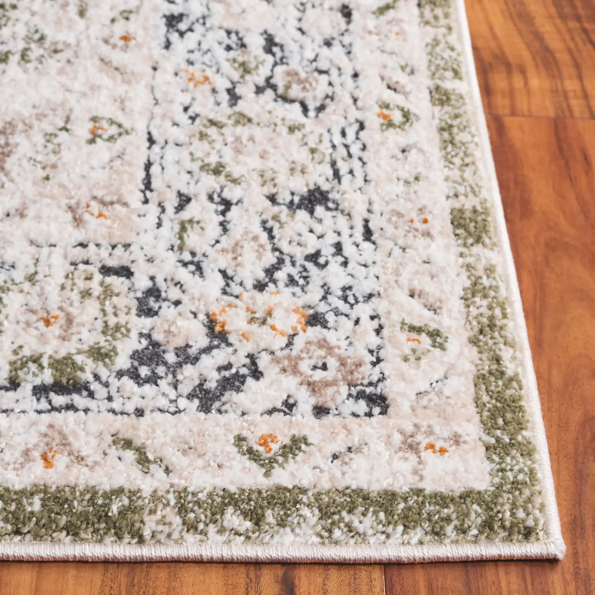 Opal Vintage Medallion Rug in Green / Beige in a styled room