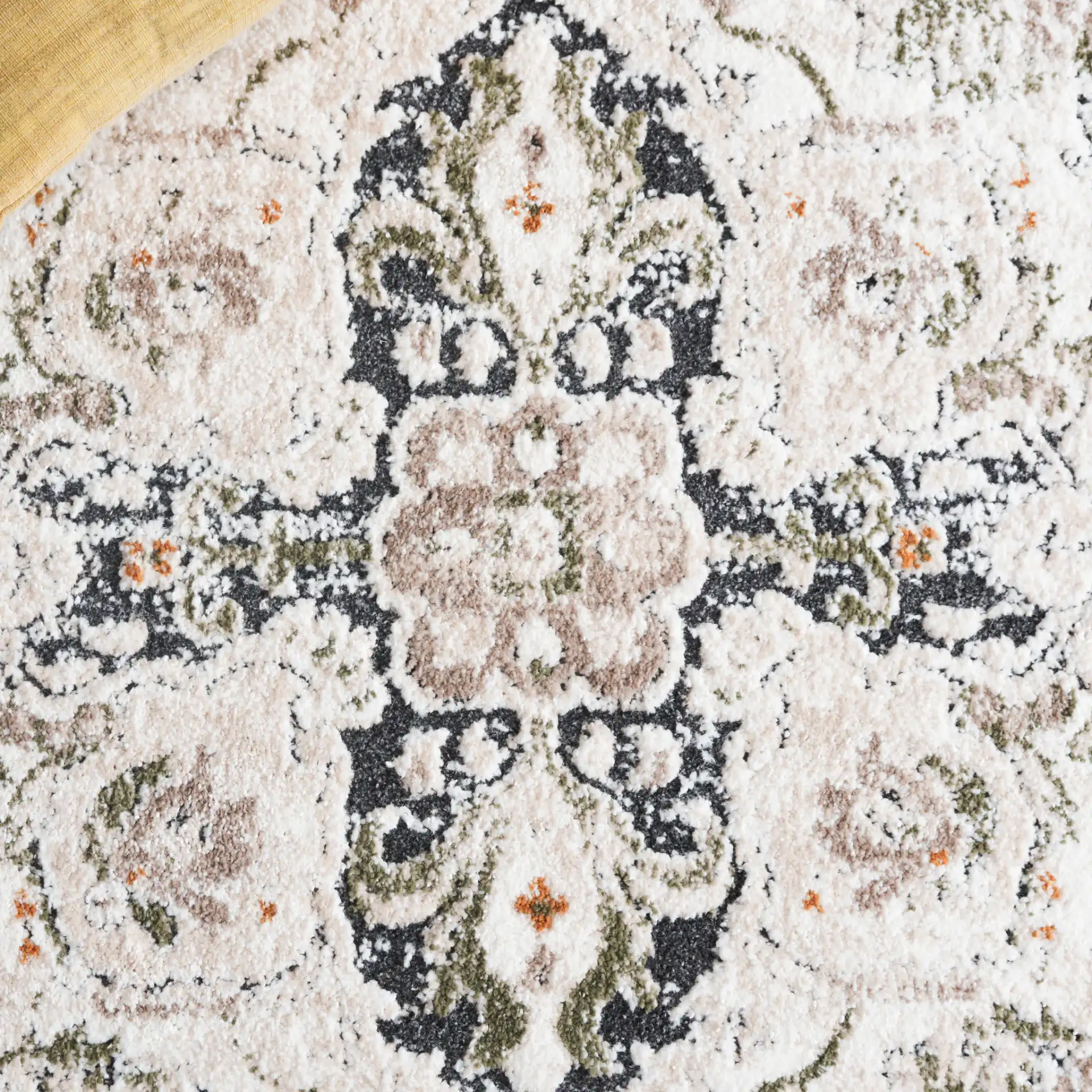 Opal Vintage Medallion Rug in Green / Beige in a styled room
