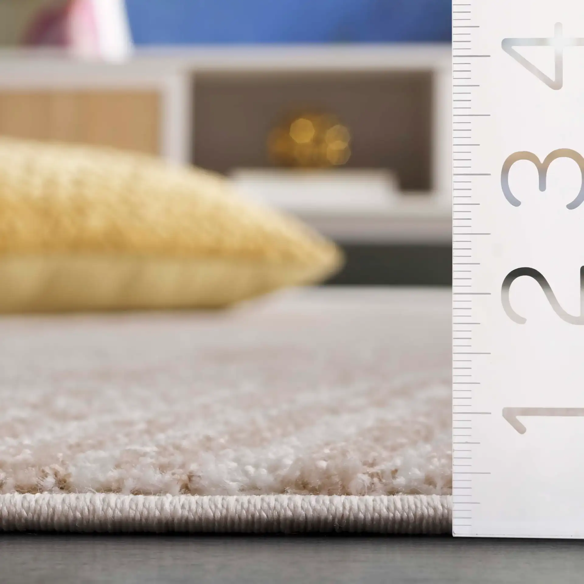Opal Concentric Wave Rug in Ivory / Beige in a styled room