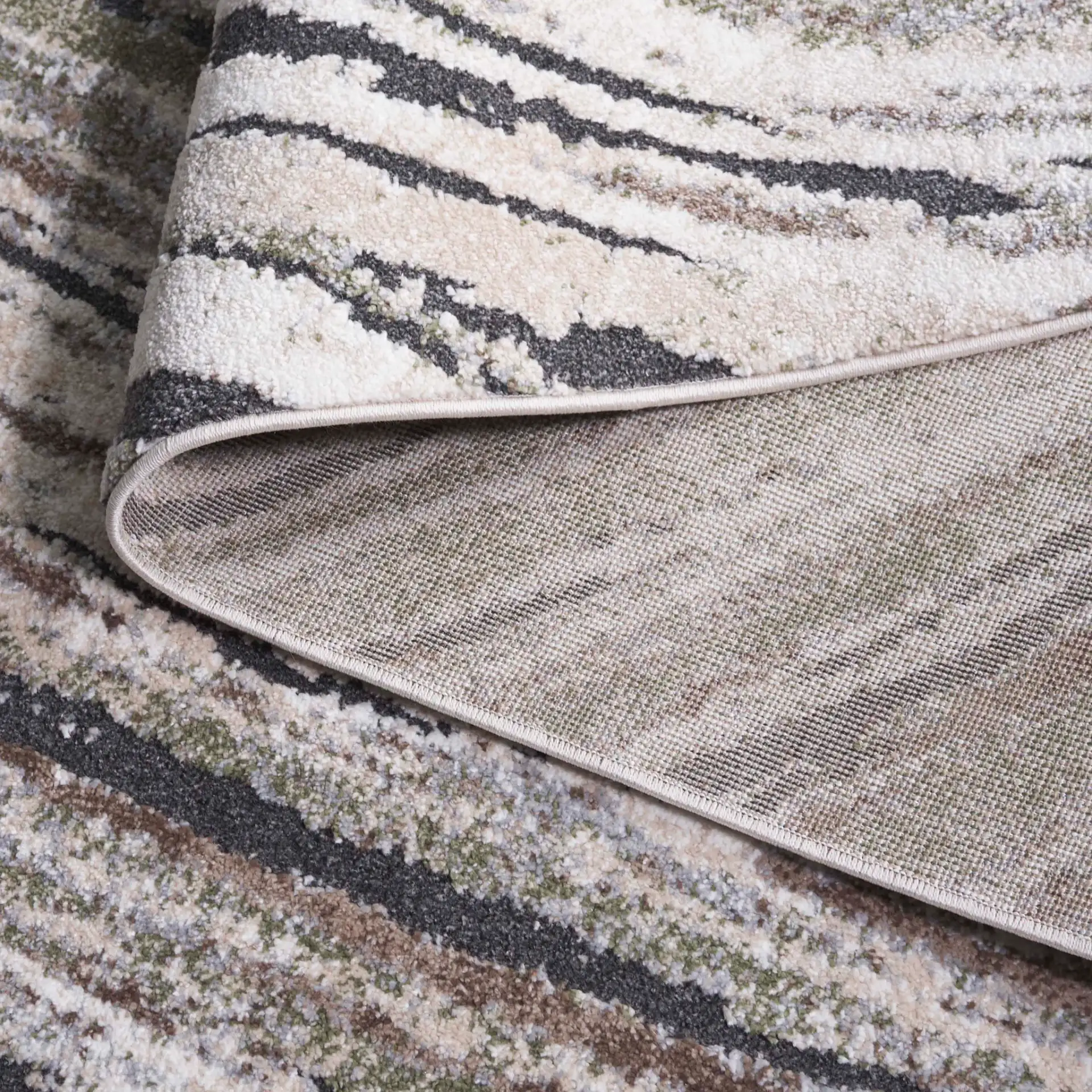 Opal Abstract Marble Rug in Green / Gray Ivory in a styled room