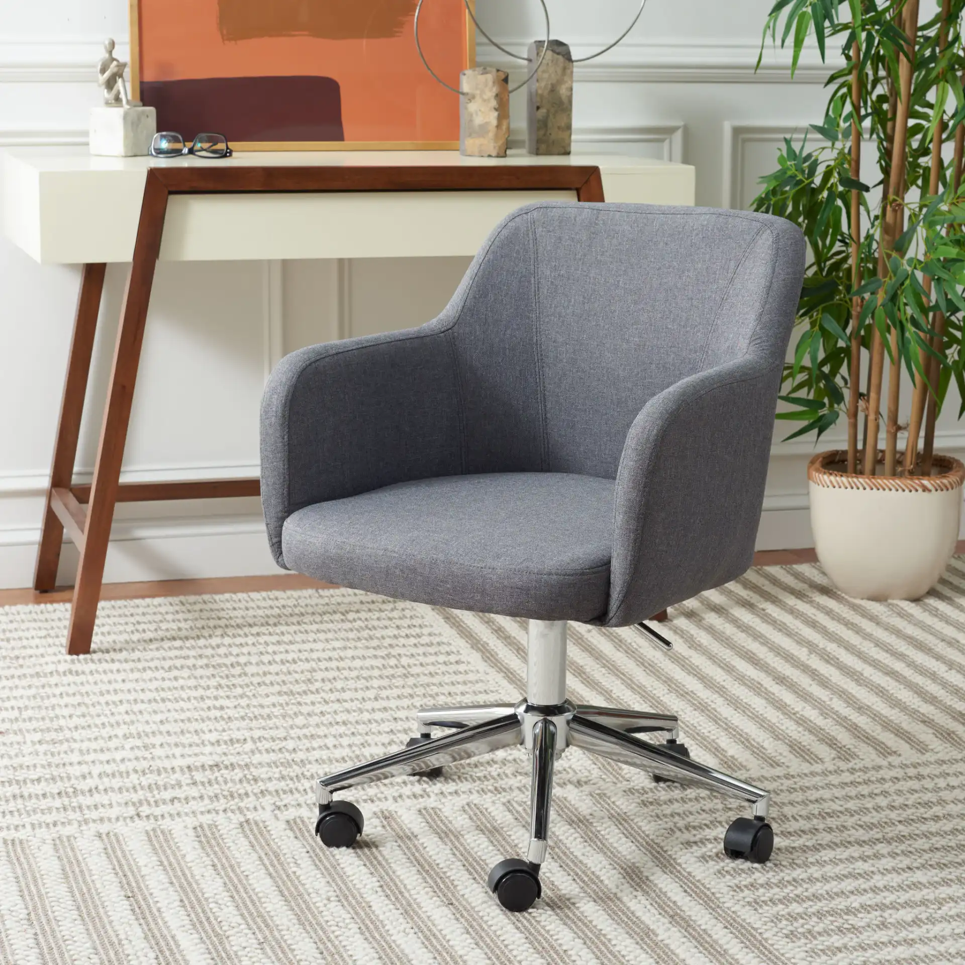Kains Swivel Office Chair in Gray / Chrome in a styled room