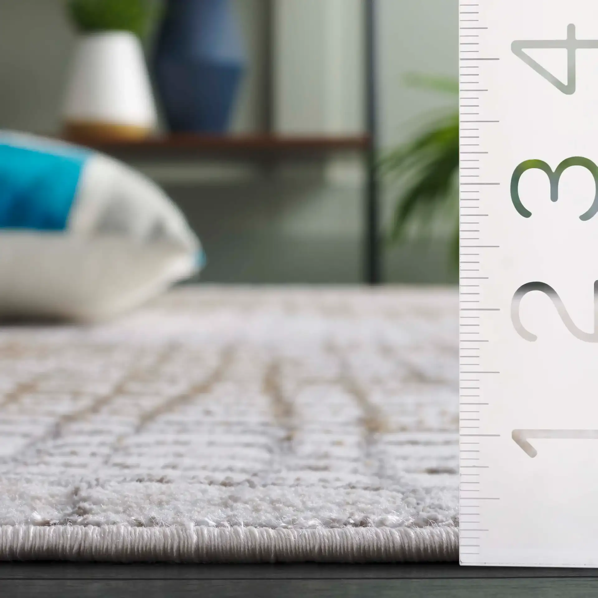 Orchard Grid Rug in Gold / Ivory in a styled room