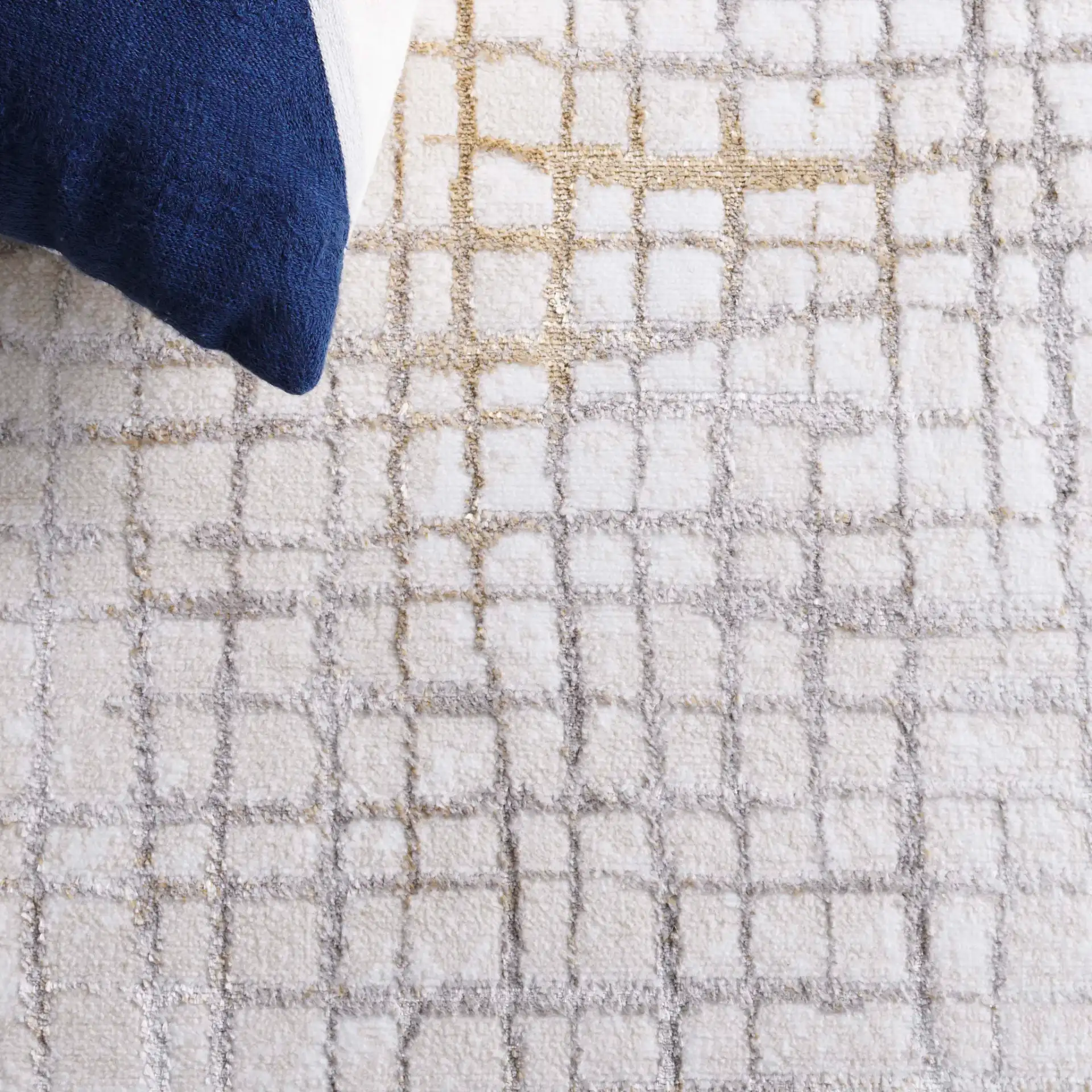 Orchard Grid Rug in Gold / Ivory in a styled room