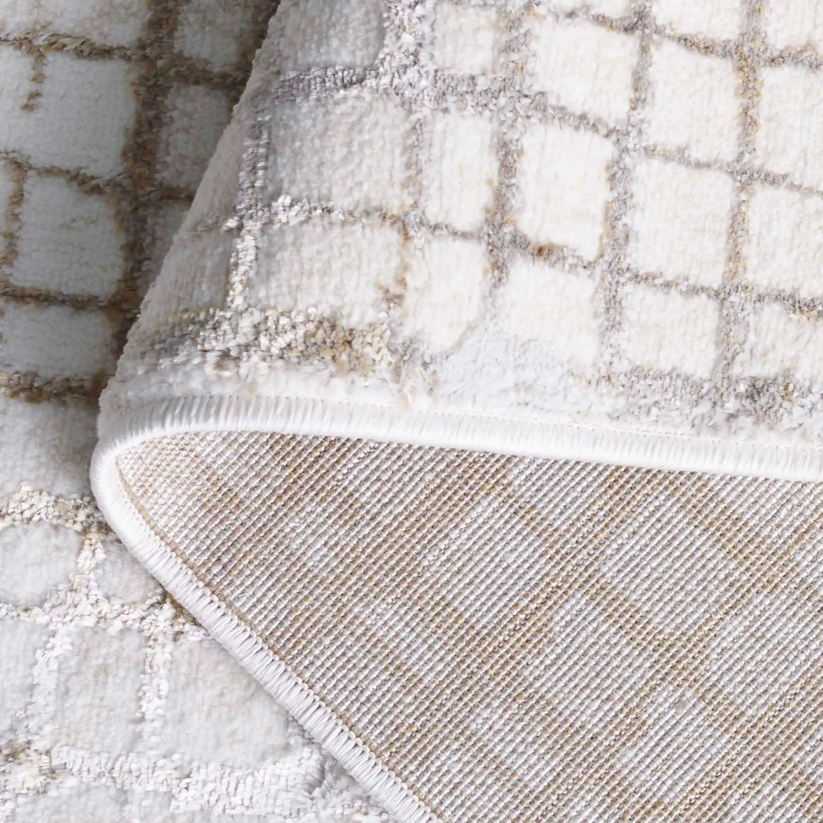 Orchard Grid Rug in Gold / Ivory in a styled room
