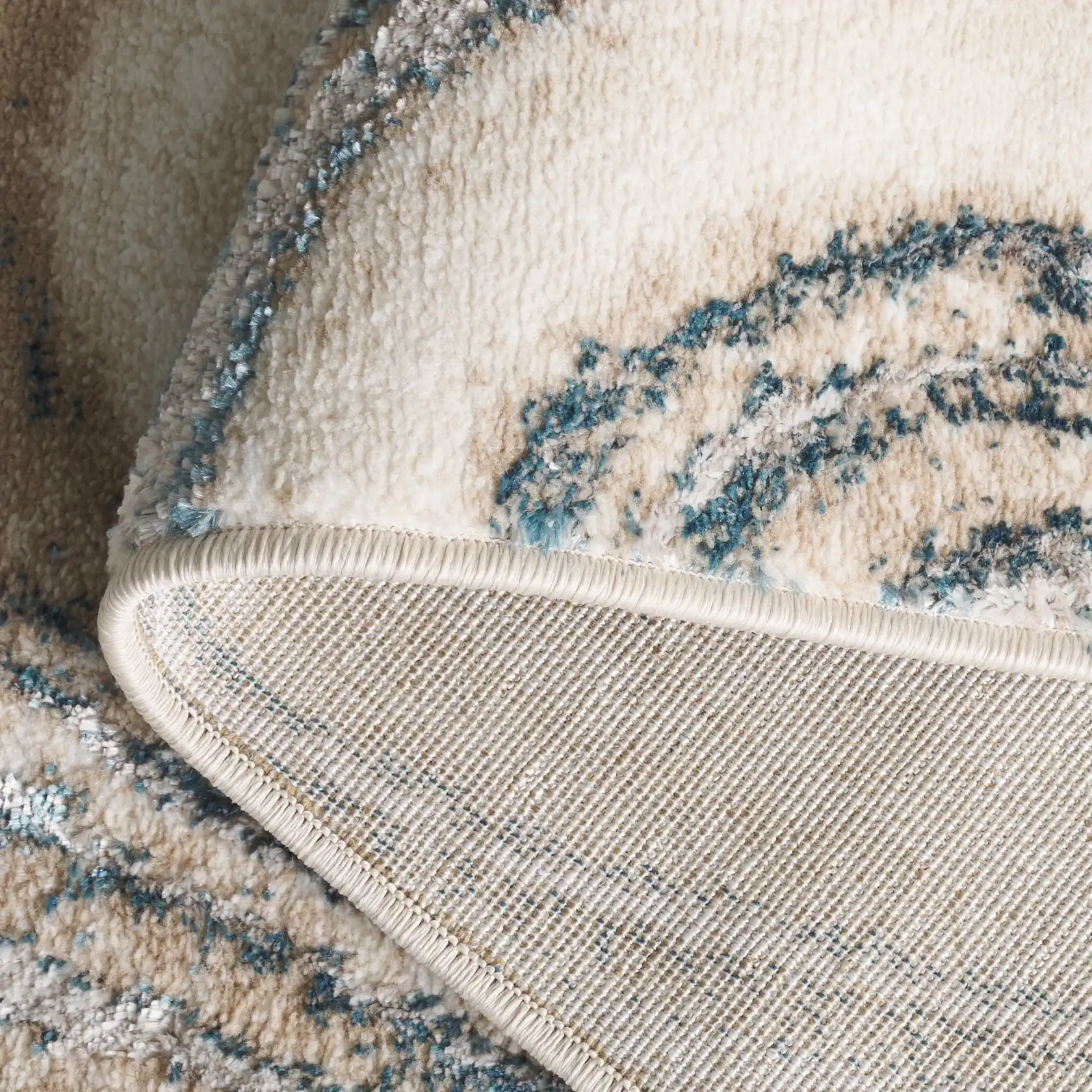 Orchard Marble Rug in Ivory / Blue in a styled room