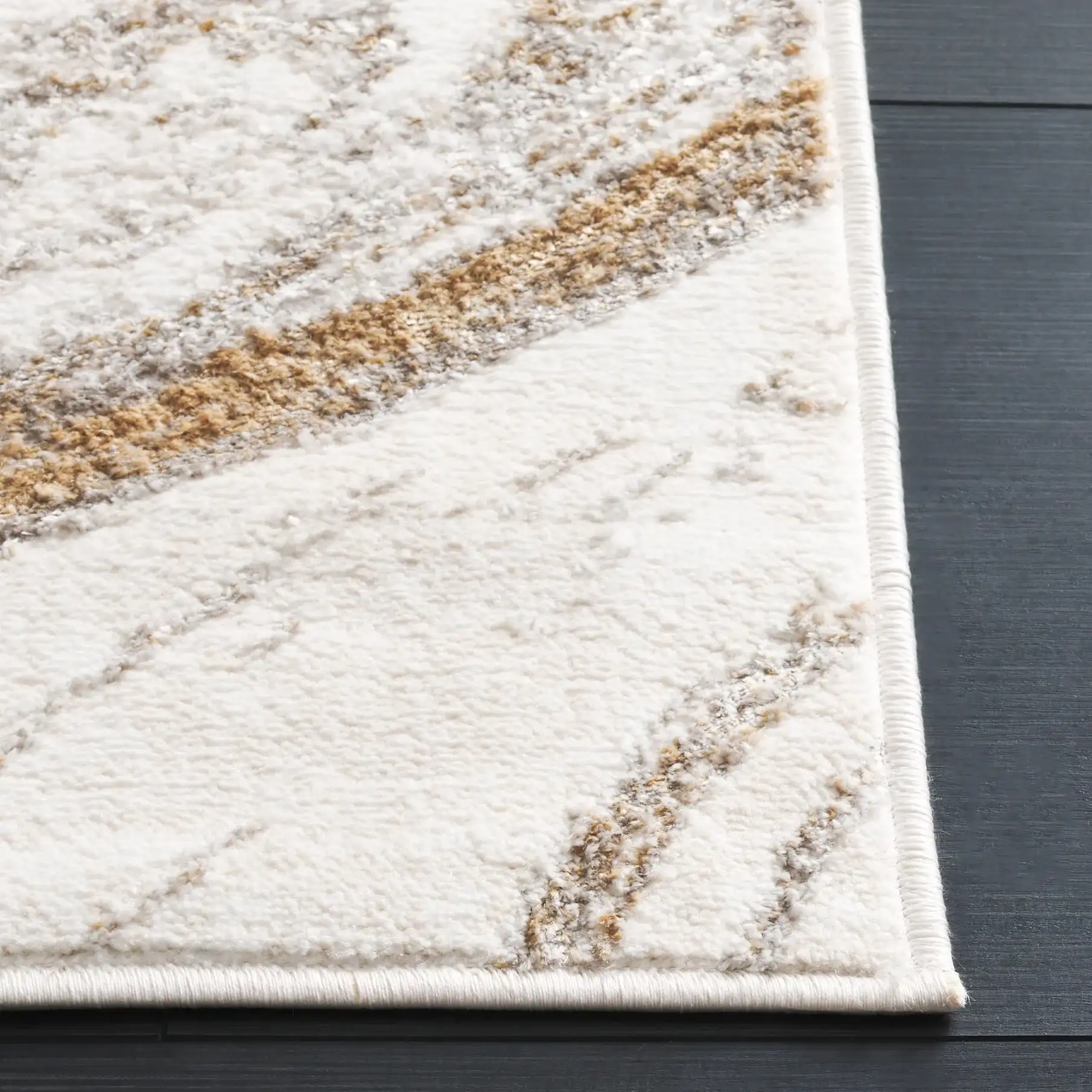Orchard Marble Wave Rug in Gray / Gold in a styled room