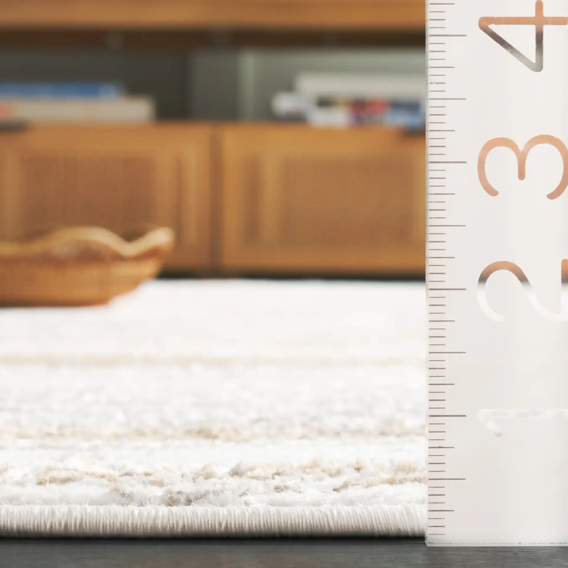 Orchard Marble Wave Rug in Gray / Gold in a styled room