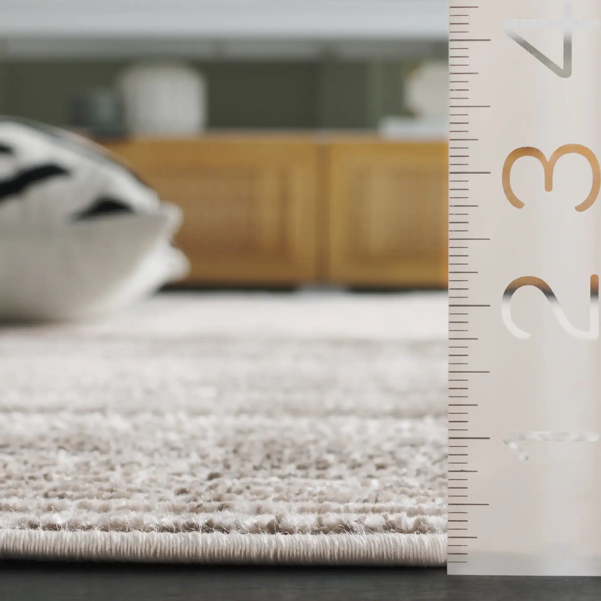 Orchard Ribbed Stripe Rug in Gray / Ivory in a styled room