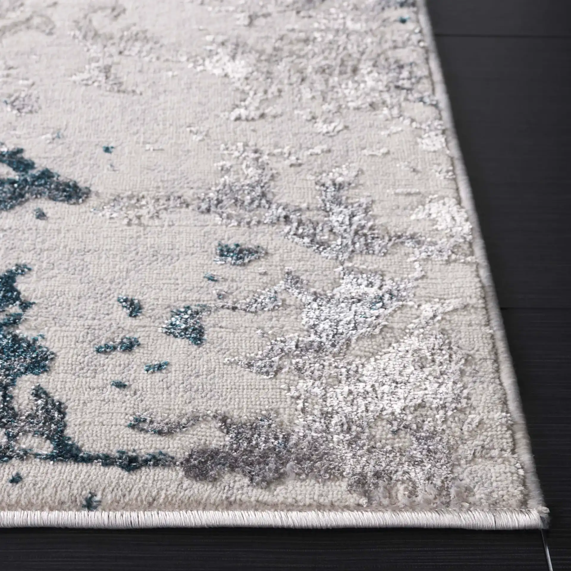 Orchard Abstract Rug in Gray / Blue in a styled room